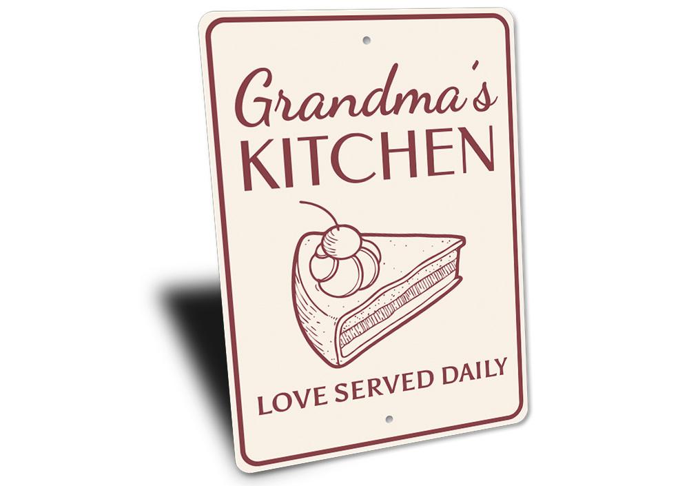 A decorative Grandma's Kitchen Sign made of high-quality aluminum, featuring customizable text and pre-drilled holes for easy mounting.