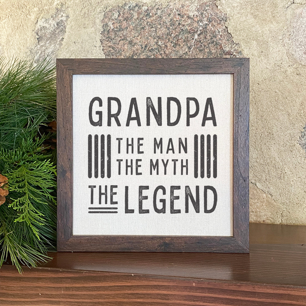 Framed sign featuring 'Grandpa / Father The Legend' with a stylish wood frame and linen-look background.