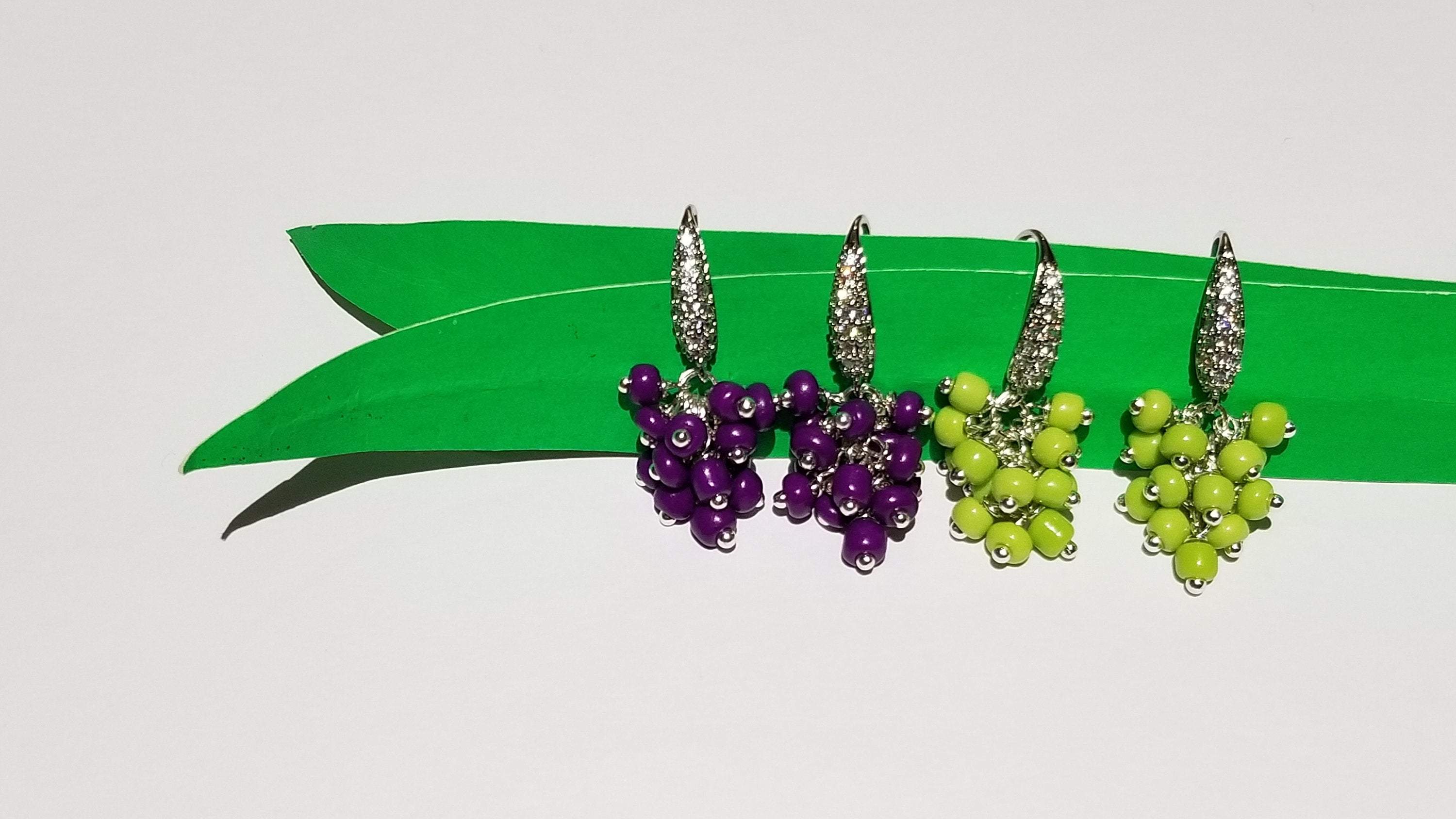 Elegant grape bunch earrings showcasing intricate design and craftsmanship.