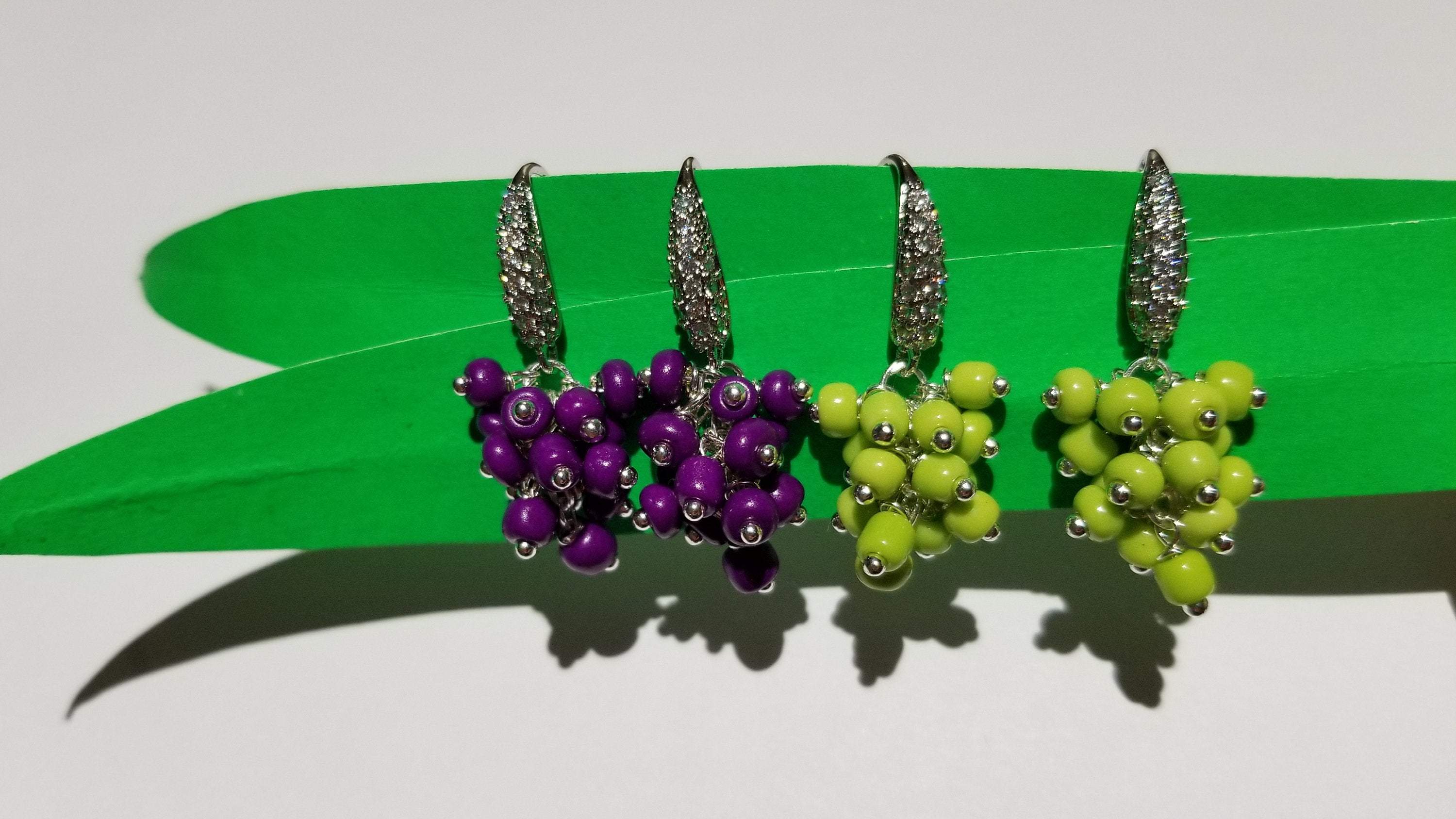 Elegant grape bunch earrings showcasing intricate design and craftsmanship.