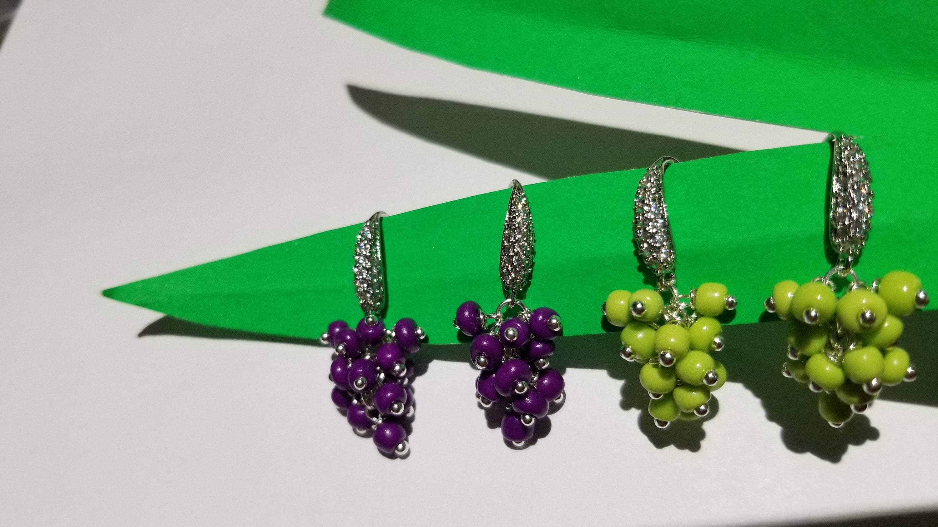 Elegant grape bunch earrings showcasing intricate design and craftsmanship.