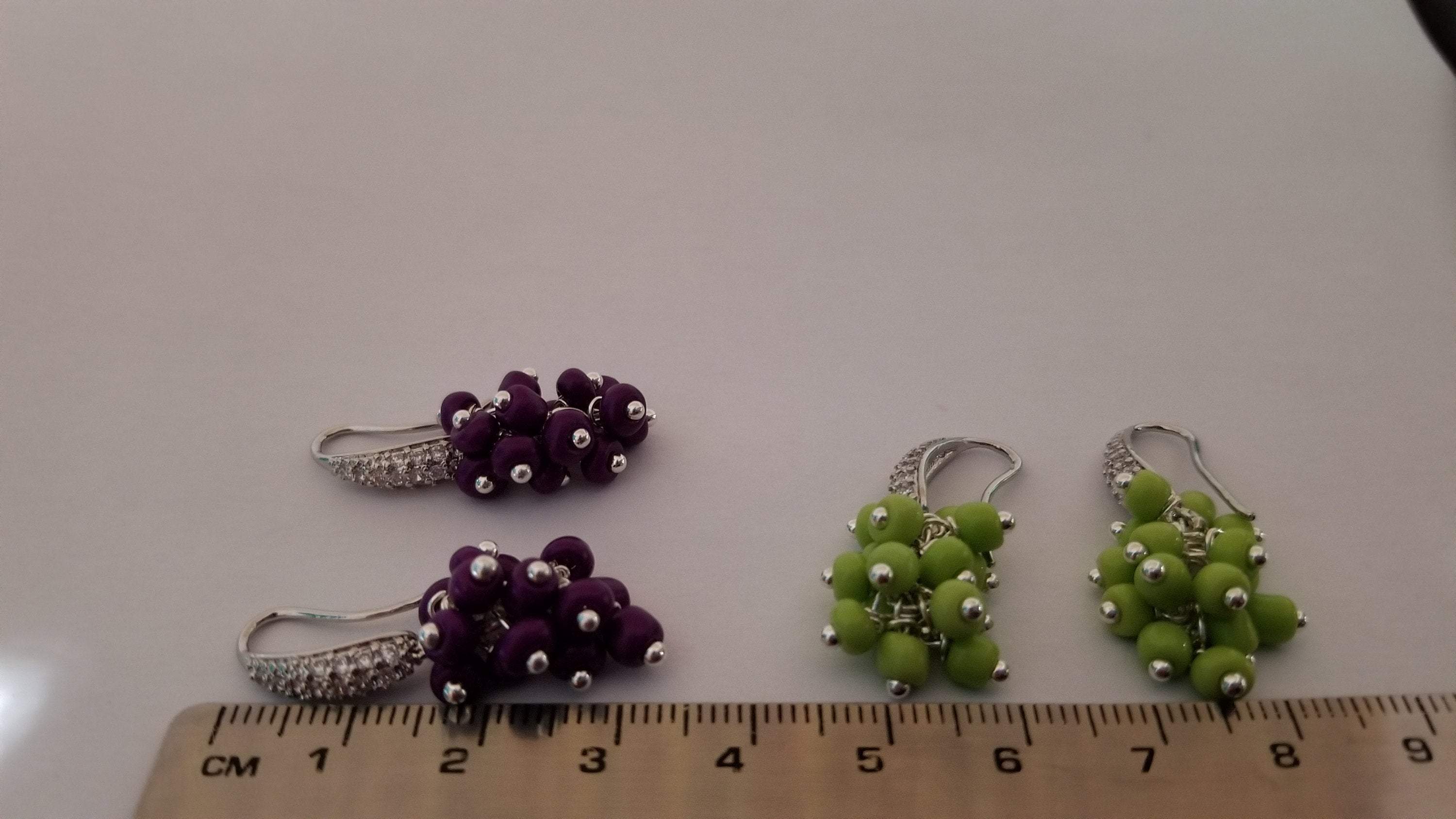 Elegant grape bunch earrings showcasing intricate design and craftsmanship.