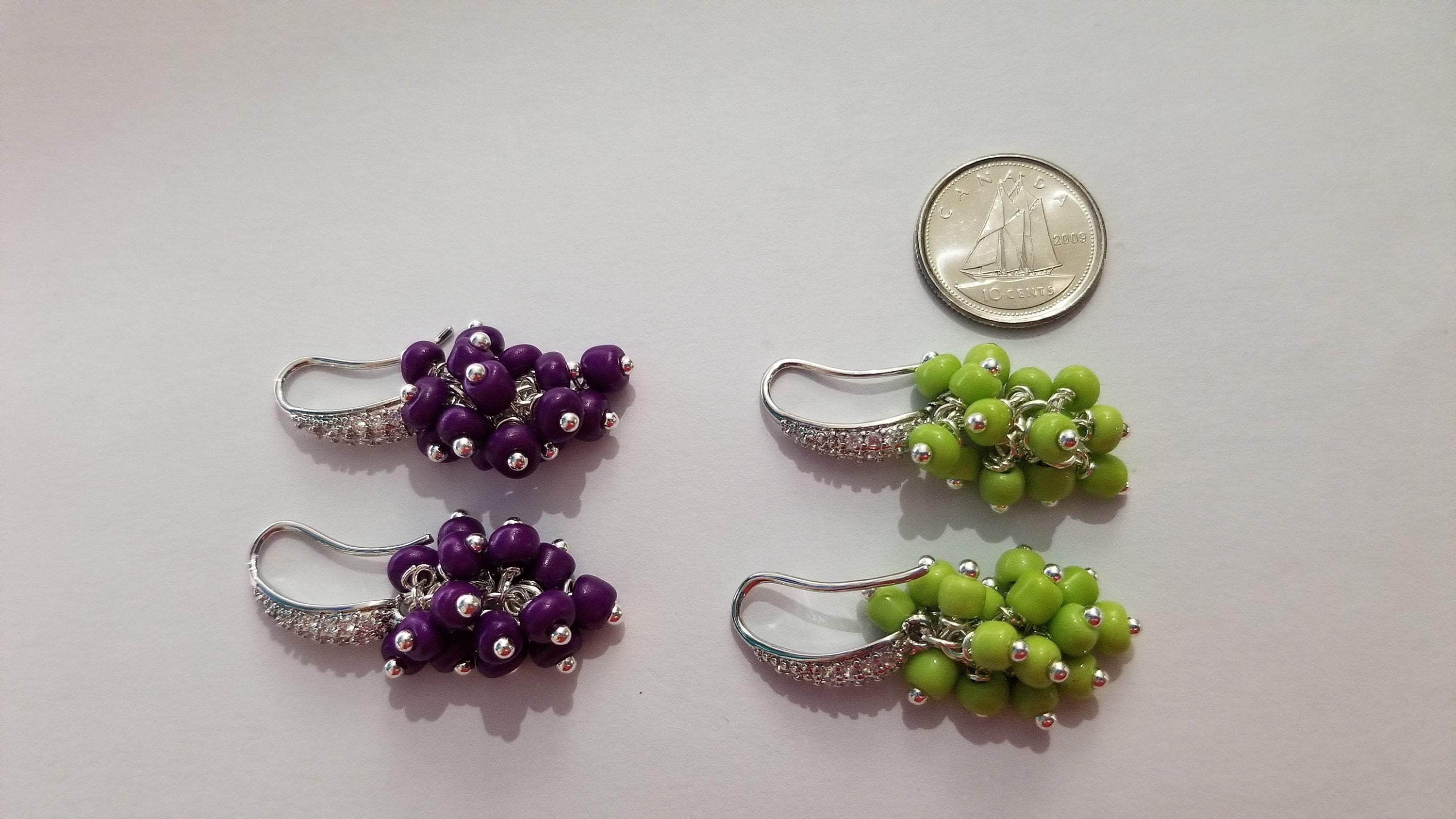 Elegant grape bunch earrings showcasing intricate design and craftsmanship.