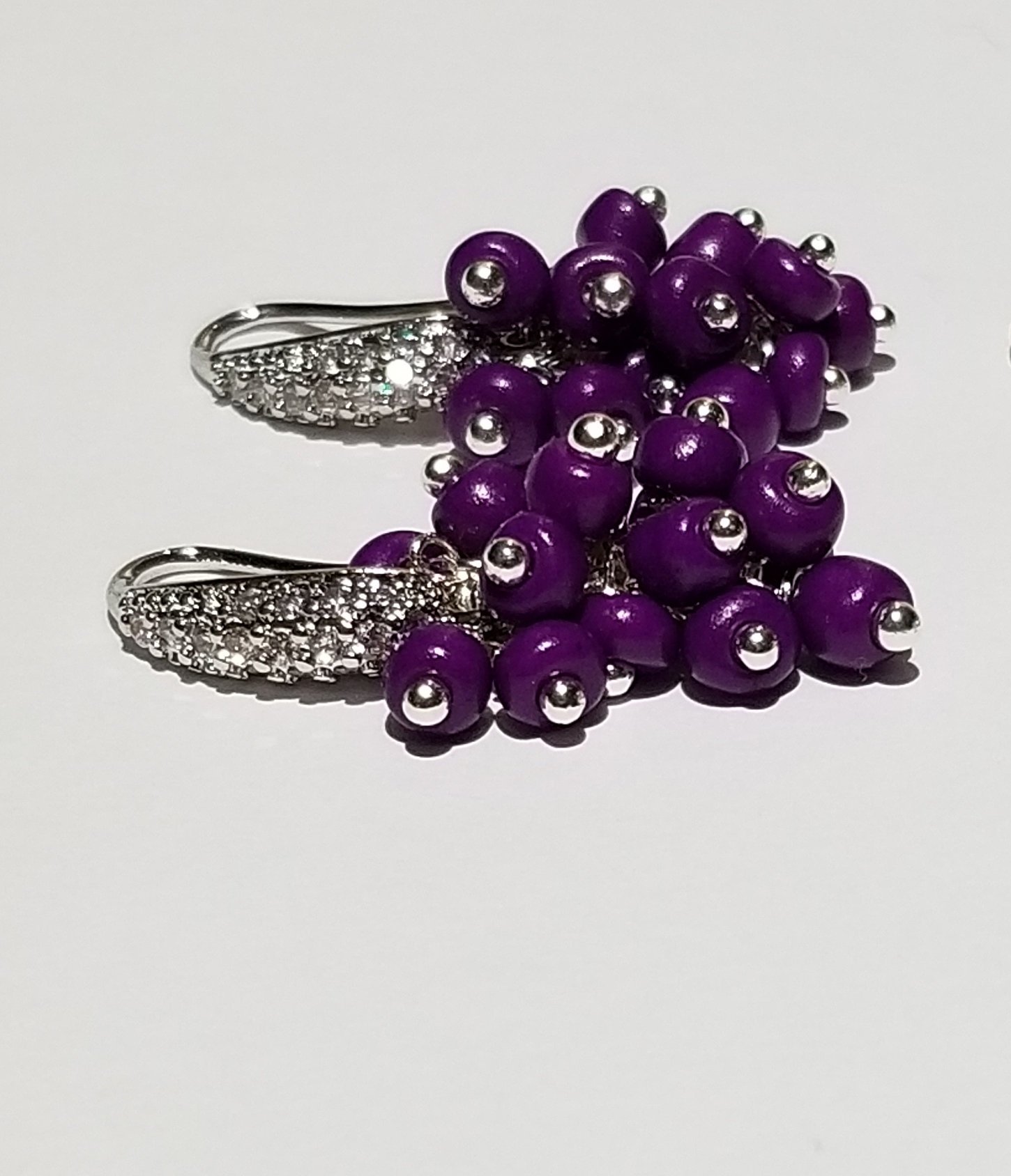 Elegant grape bunch earrings showcasing intricate design and craftsmanship.