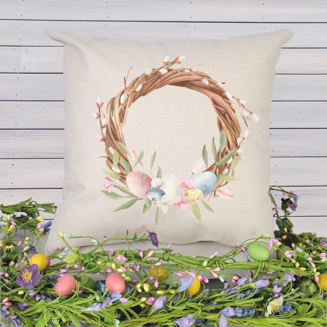 Grapevine Egg Wreath Pillow Cover featuring floral design on woven linen fabric, ideal for Spring and Easter decor.