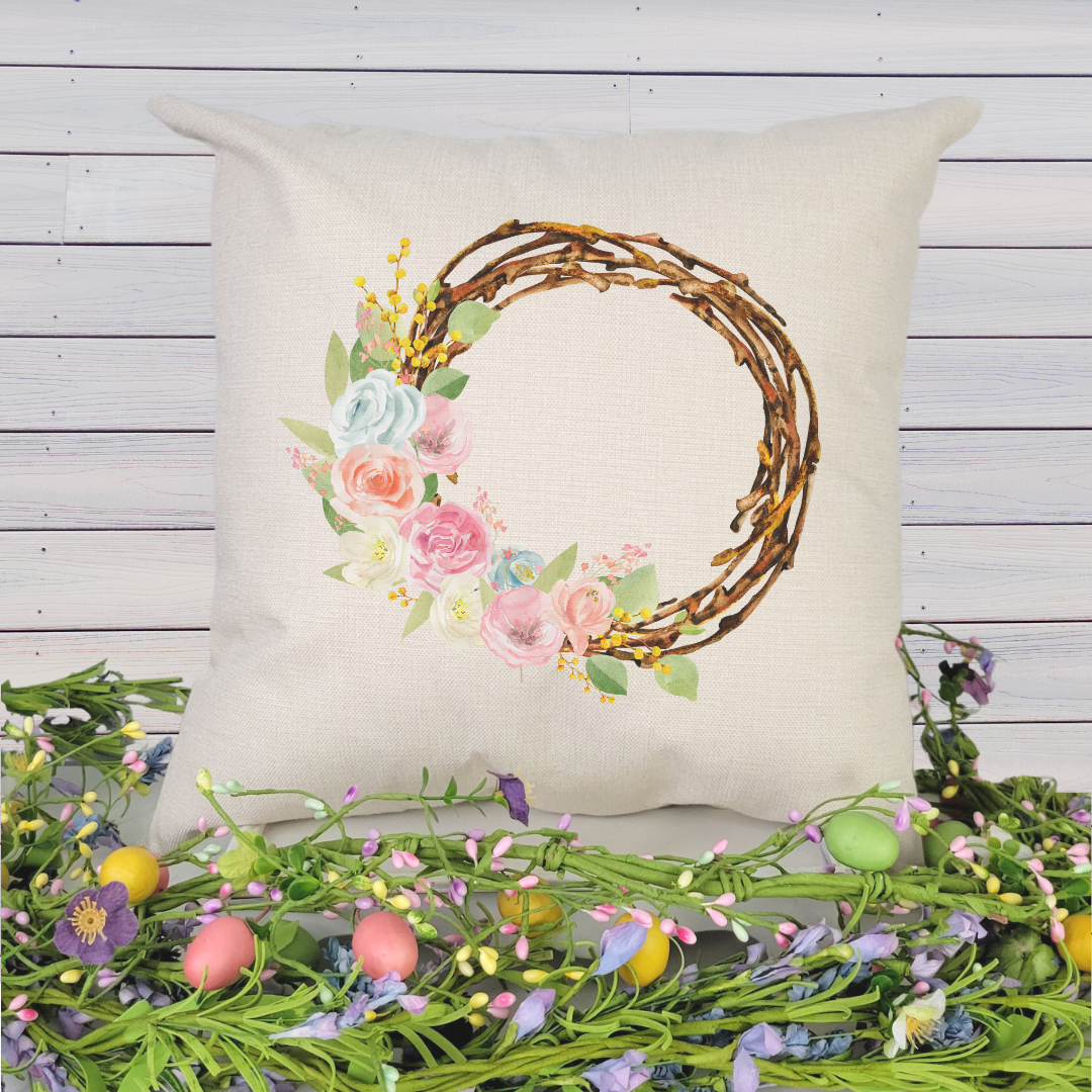 Grapevine Floral Wreath Pillow Cover featuring a floral design on a soft linen fabric with a hidden zipper.