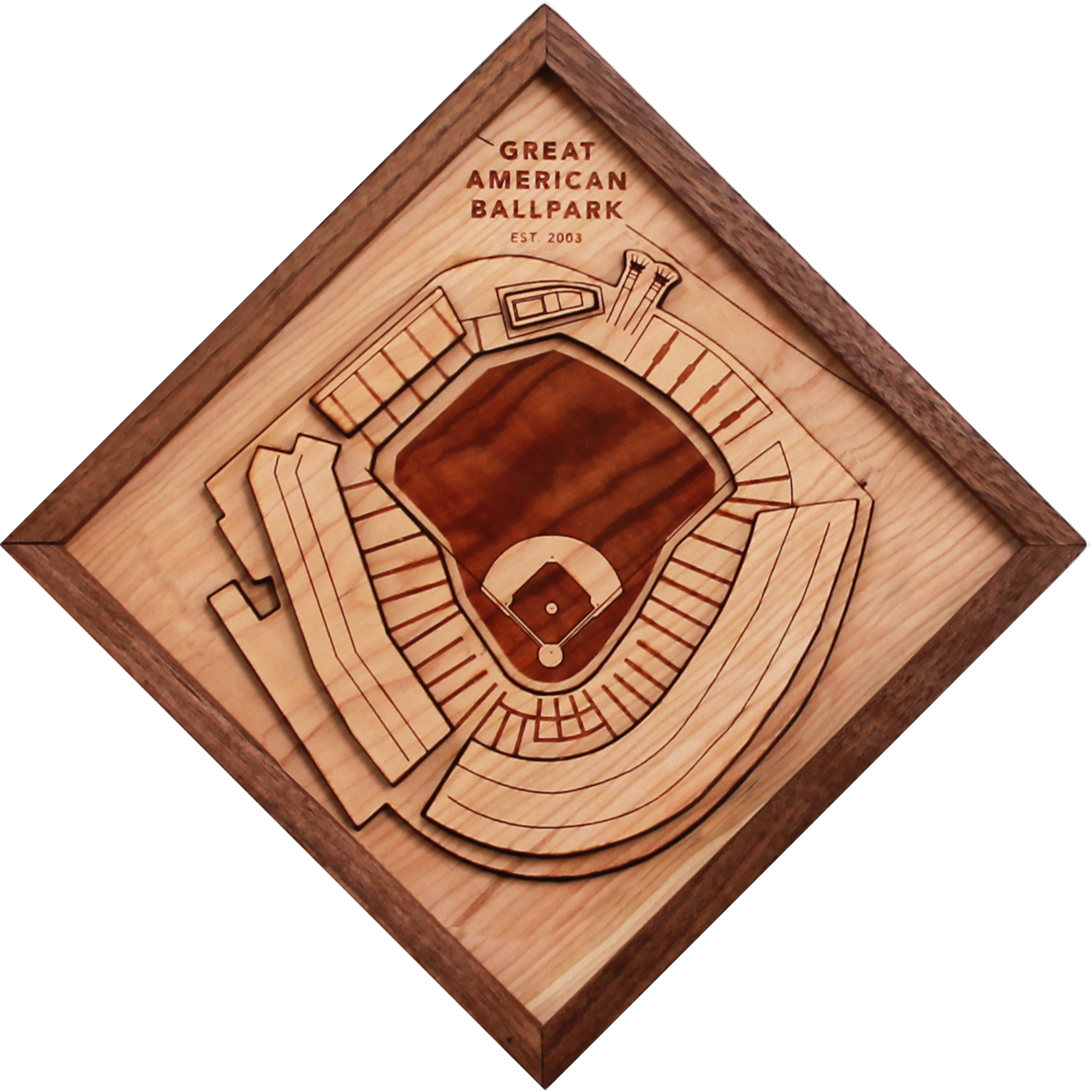 A beautifully crafted wooden model of the Great American Ballpark, featuring intricate details like smokestacks and a riverboat, framed in black walnut.