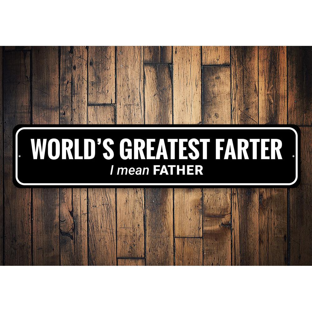 A humorous metal sign reading 'Greatest Farter' designed for home decor, featuring a playful font and vibrant colors.