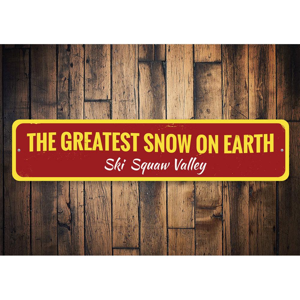 Greatest Snow On Earth Sign made of high-quality aluminum, featuring customizable text and pre-drilled holes for easy mounting.