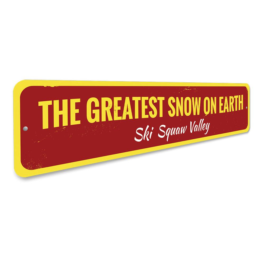 Greatest Snow On Earth Sign made of high-quality aluminum, featuring customizable text and pre-drilled holes for easy mounting.