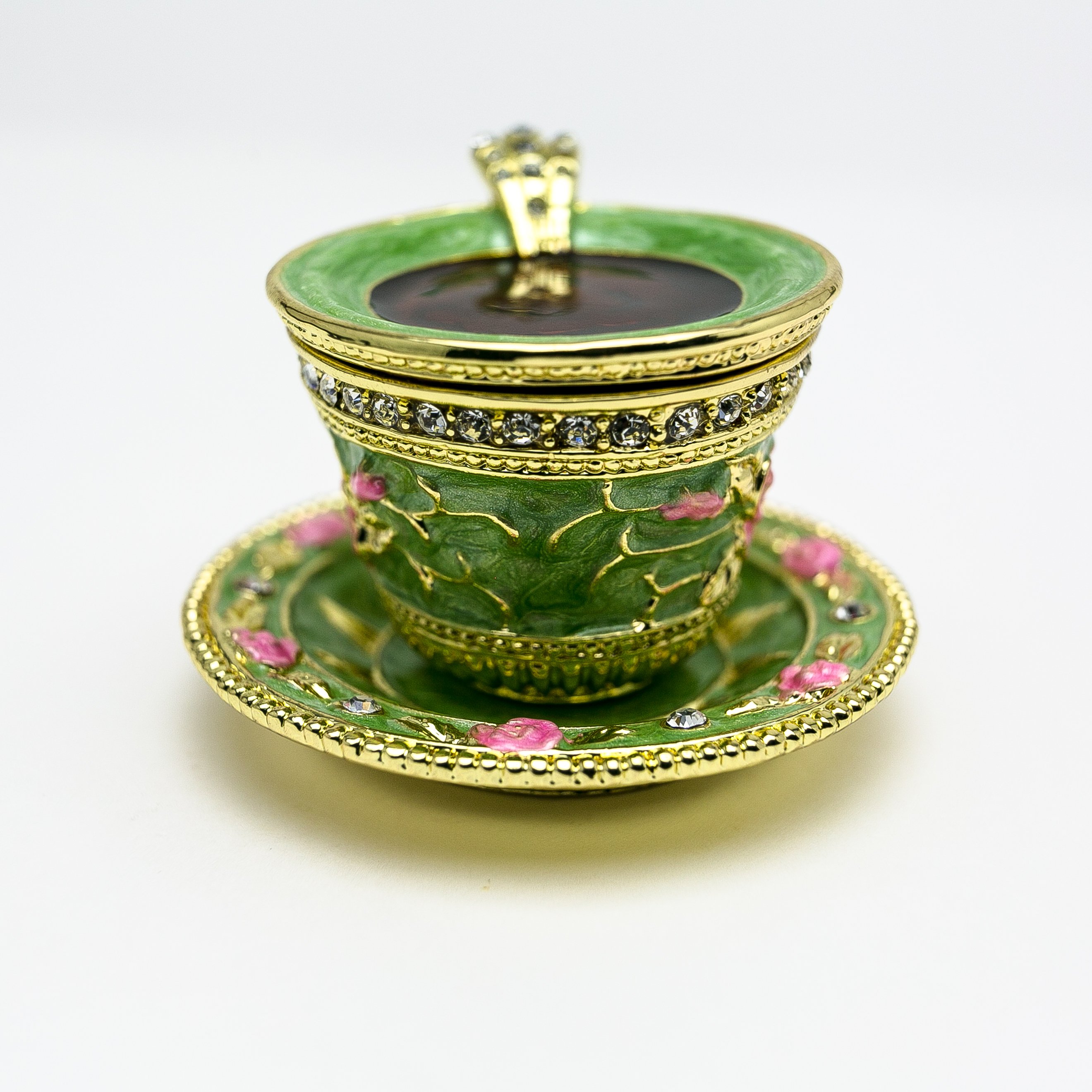 A beautifully handcrafted Green Cup of Tea trinket box adorned with Austrian crystals and plated with 24K gold, showcasing intricate enamel work.