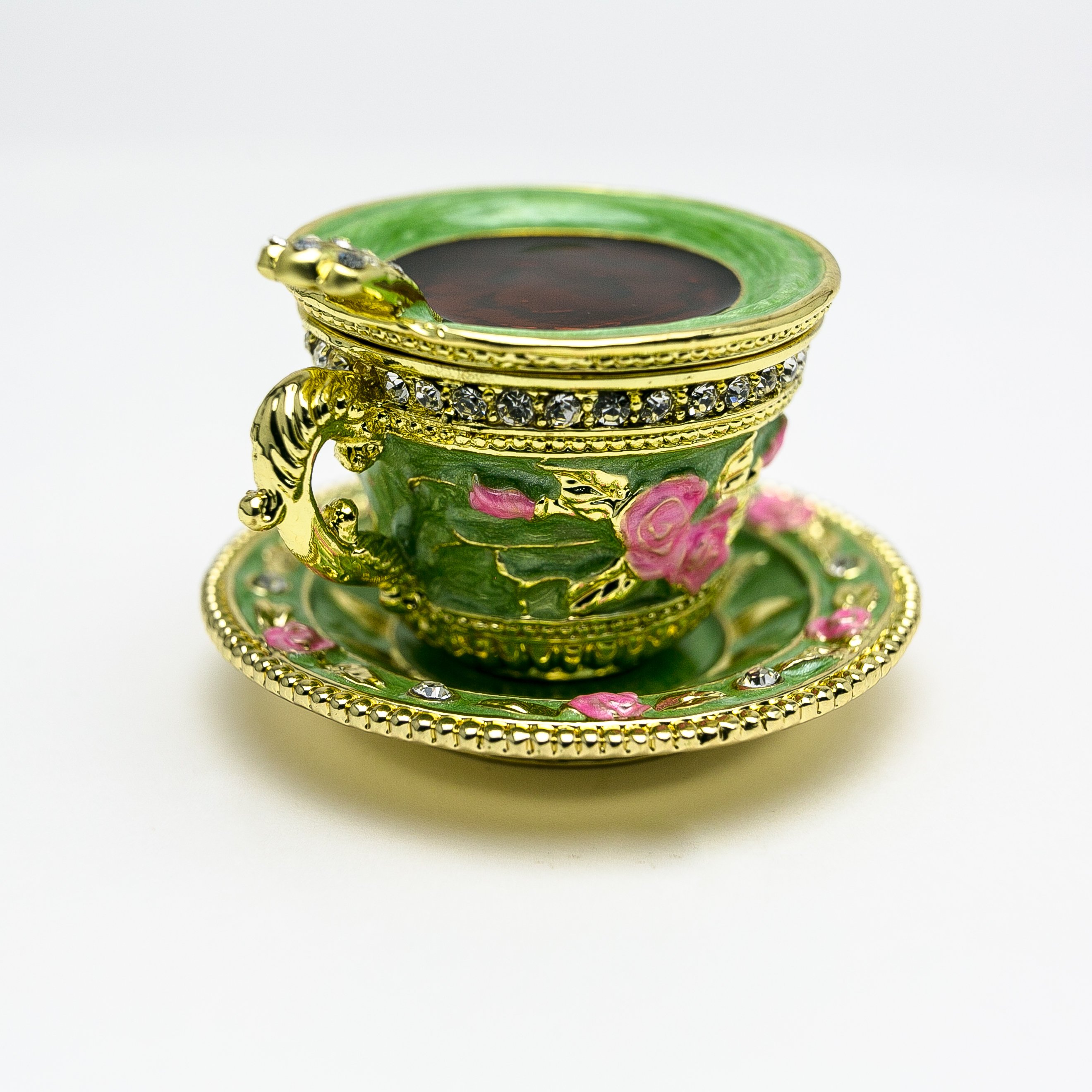 A beautifully handcrafted Green Cup of Tea trinket box adorned with Austrian crystals and plated with 24K gold, showcasing intricate enamel work.