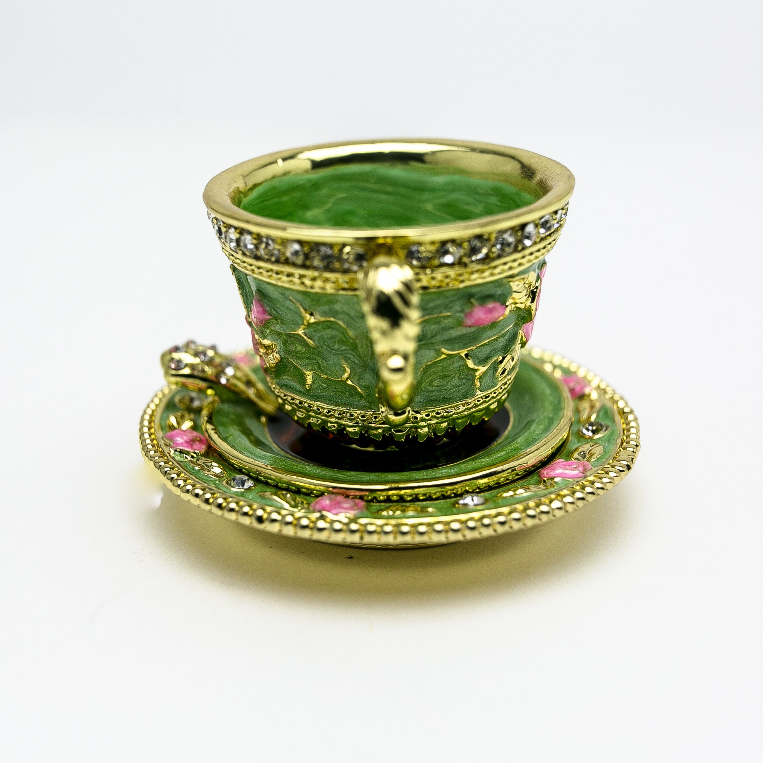 A beautifully handcrafted Green Cup of Tea trinket box adorned with Austrian crystals and plated with 24K gold, showcasing intricate enamel work.