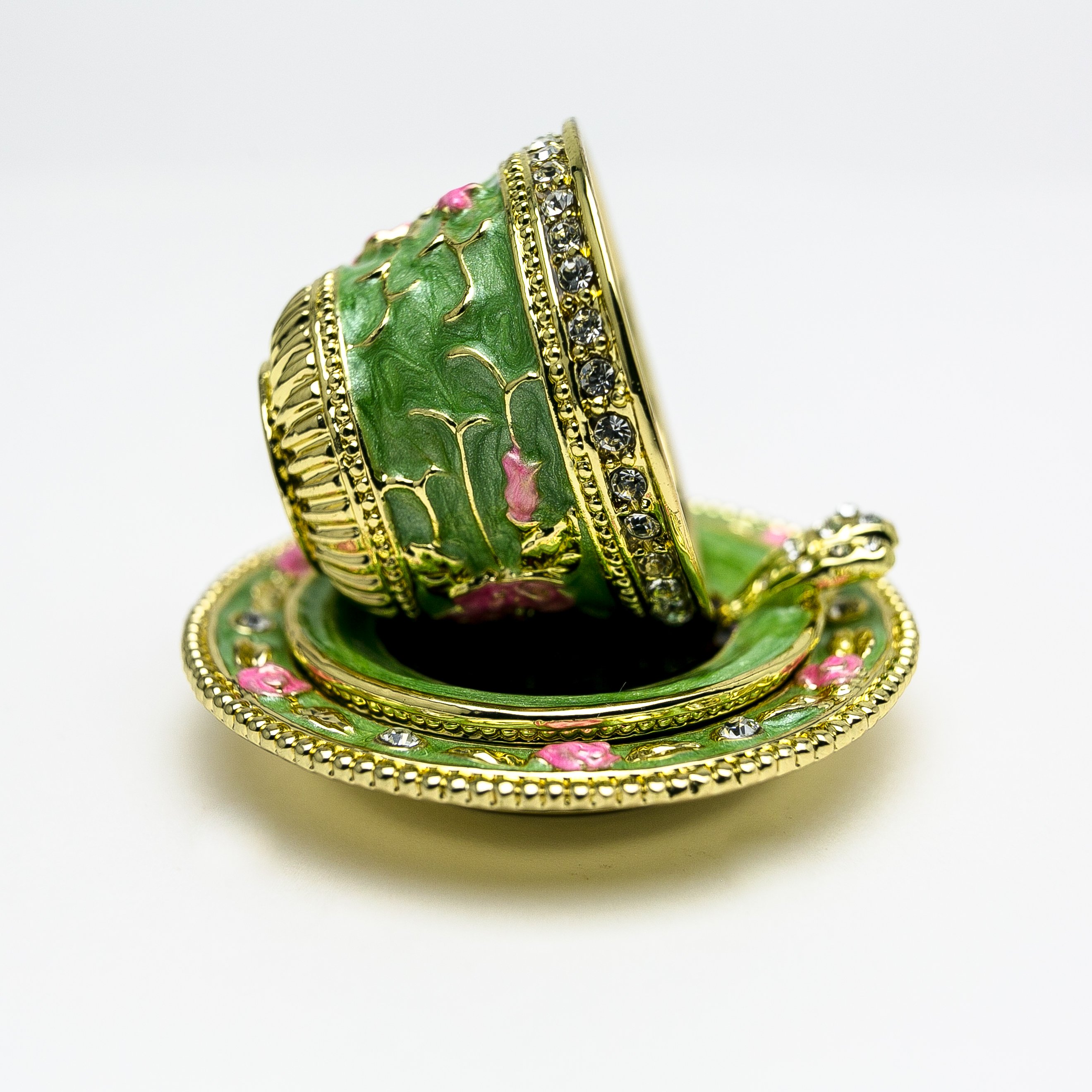 A beautifully handcrafted Green Cup of Tea trinket box adorned with Austrian crystals and plated with 24K gold, showcasing intricate enamel work.