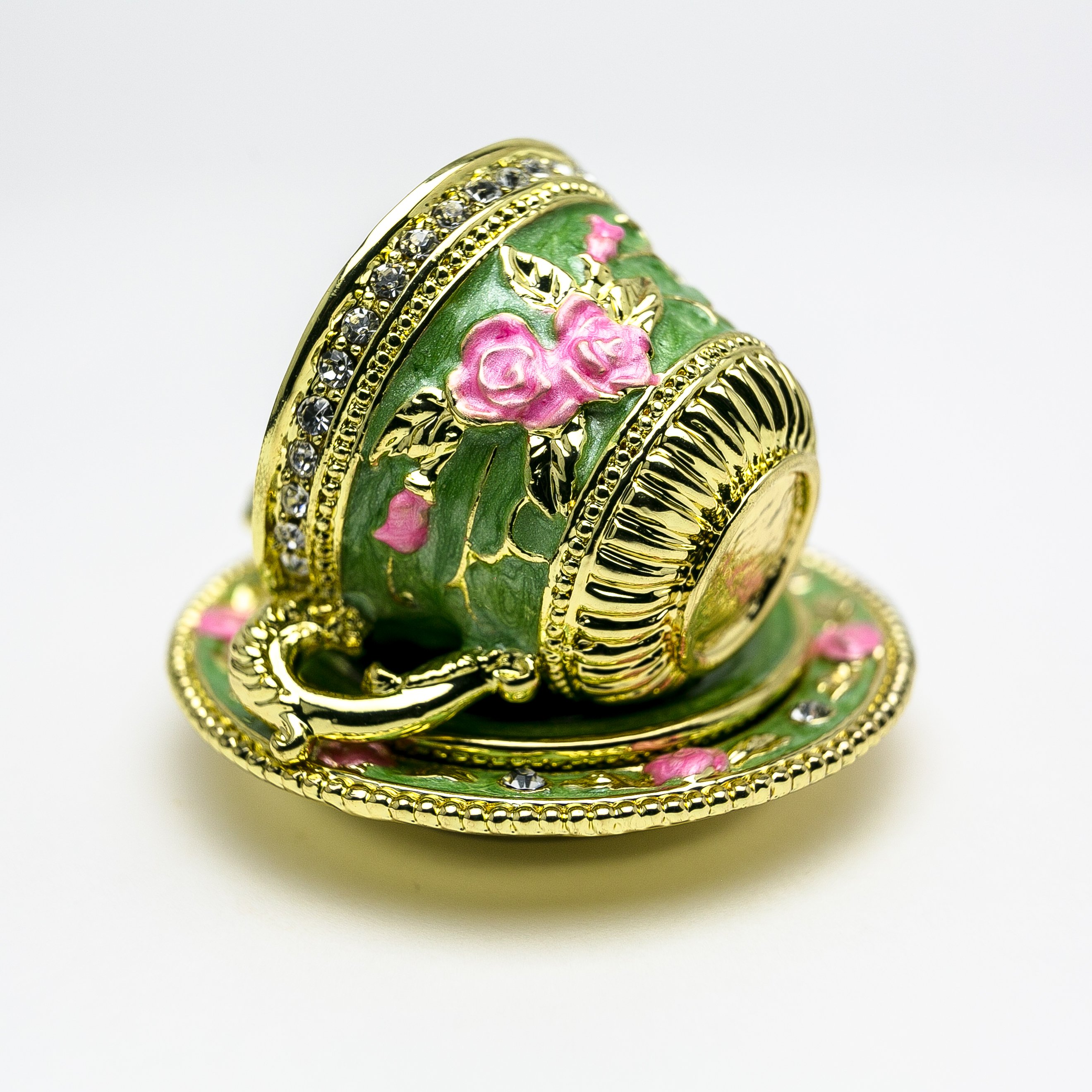 A beautifully handcrafted Green Cup of Tea trinket box adorned with Austrian crystals and plated with 24K gold, showcasing intricate enamel work.