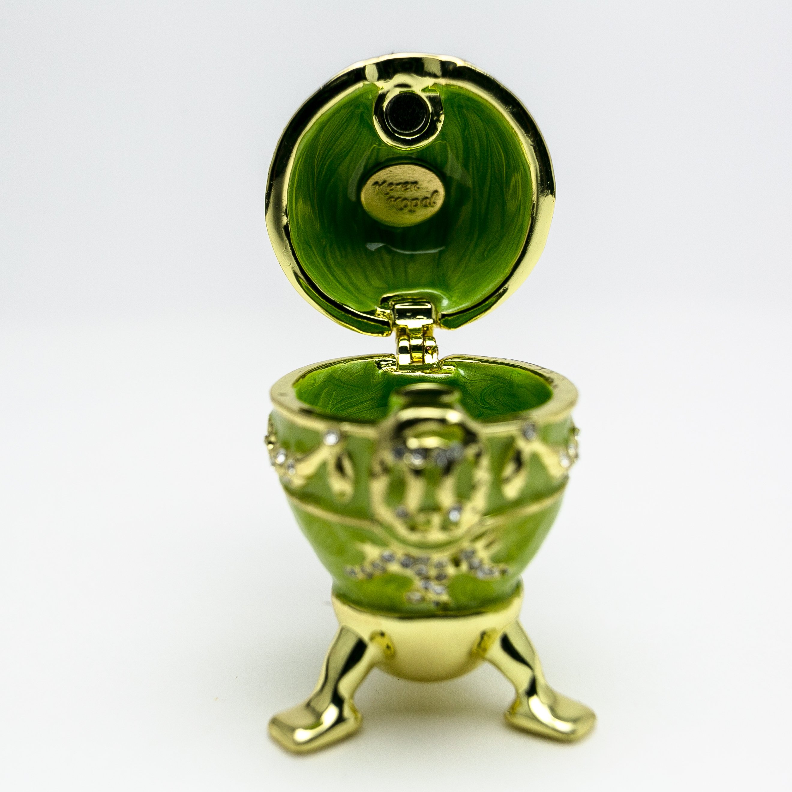 Handmade Green Faberge Egg trinket box with heart on top, adorned with Austrian crystals and 24K gold plating.