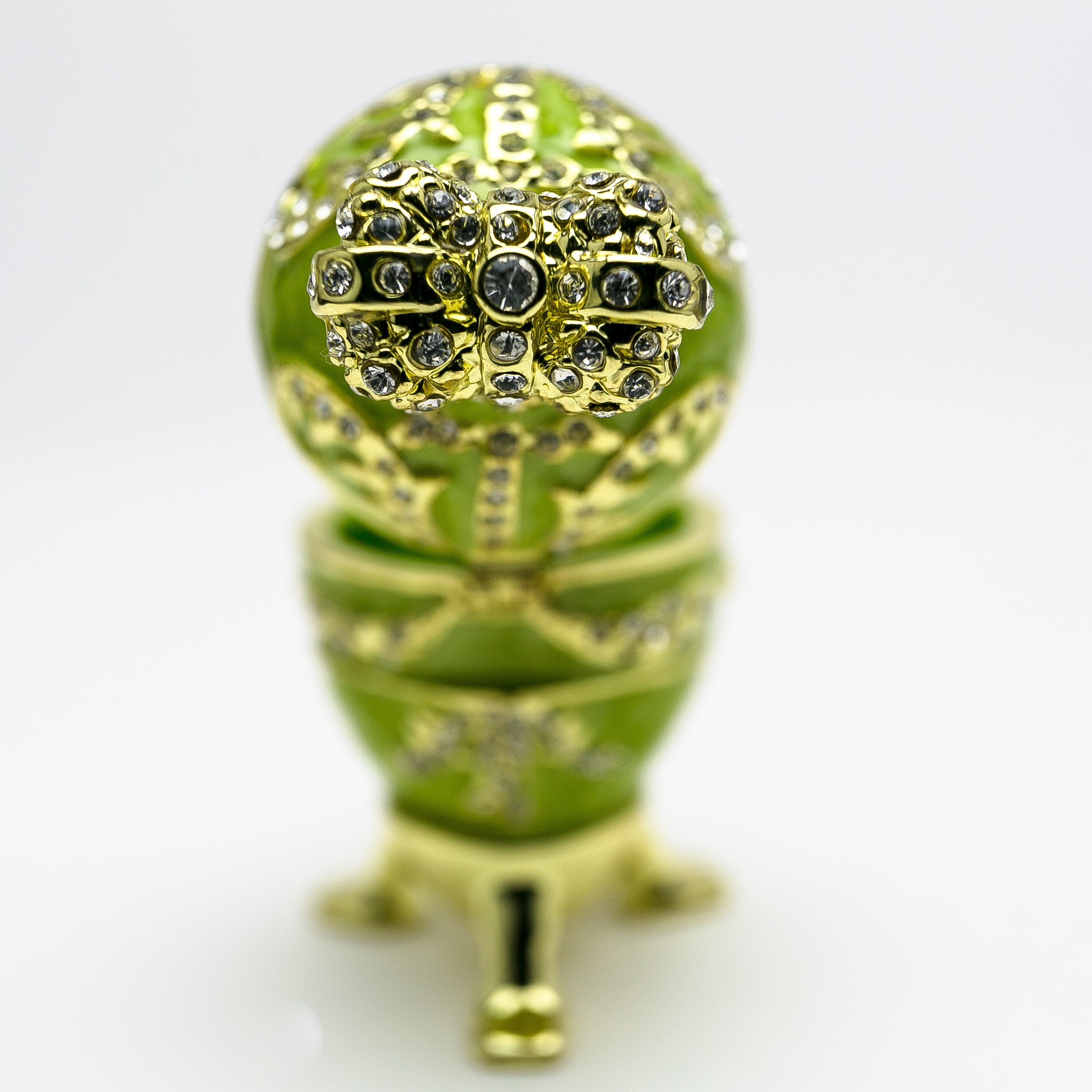 Handmade Green Faberge Egg trinket box with heart on top, adorned with Austrian crystals and 24K gold plating.