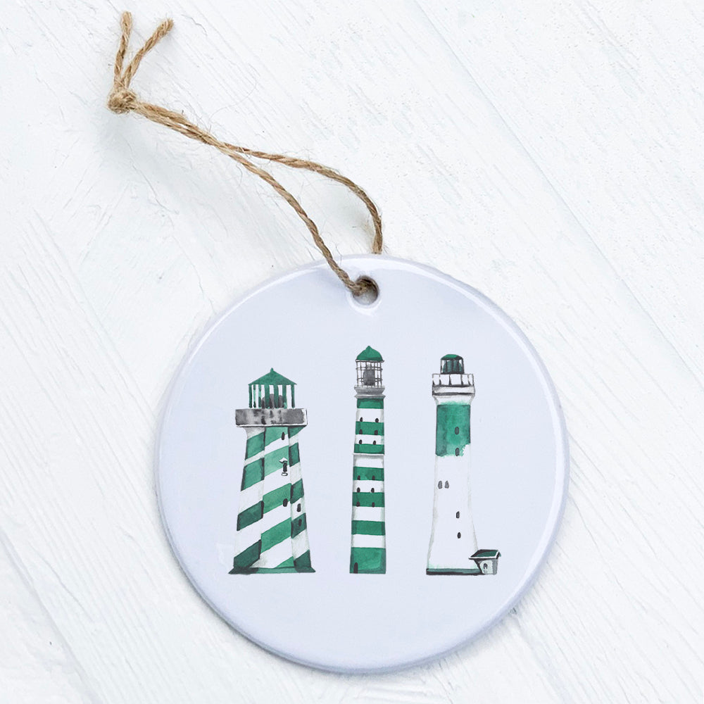 A beautifully crafted Green Lighthouses Ornament made of high-quality porcelain, featuring a vibrant design and smooth gloss finish.