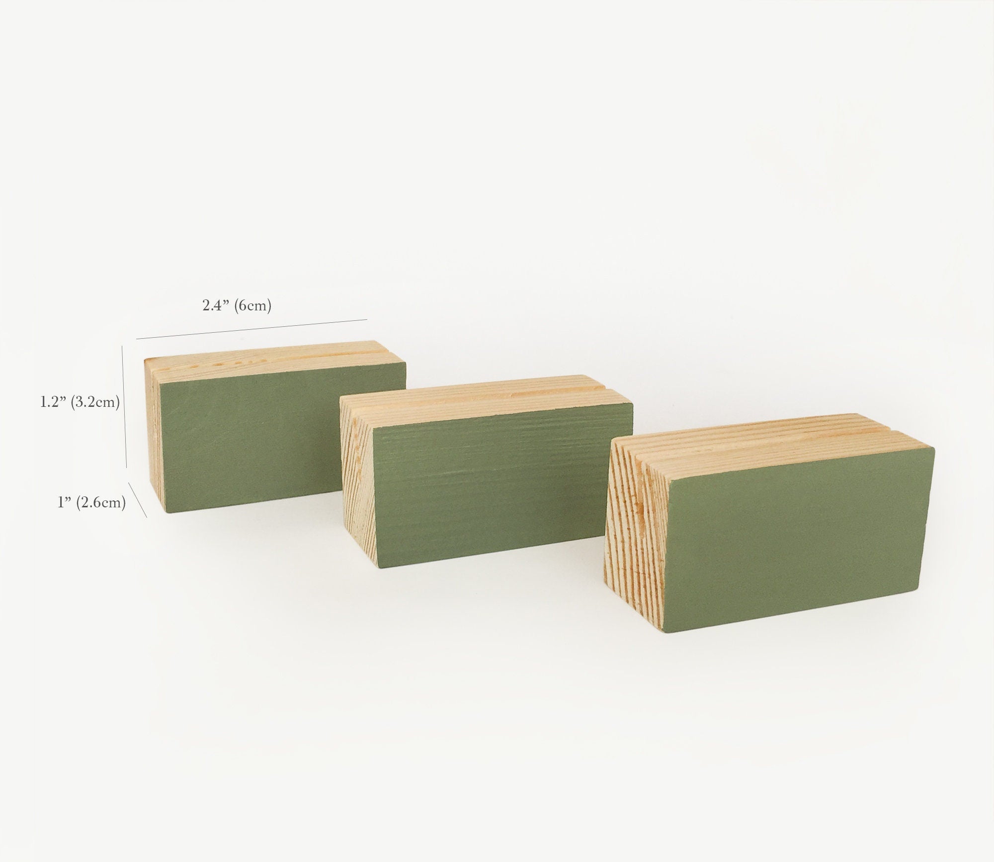 Green ombre block card holder made from eco-friendly wood, showcasing its stylish design and color options.