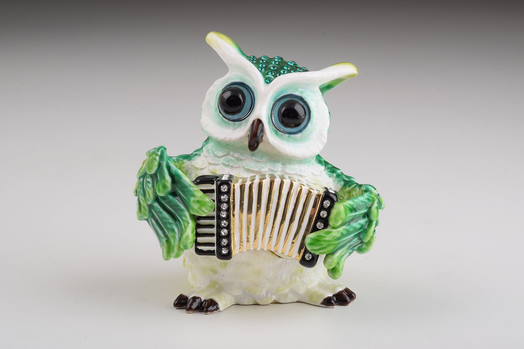 Handmade Green Owl Playing Accordion Trinket Box with Austrian crystals and 24K gold plating, featuring a secure magnetic fastener.