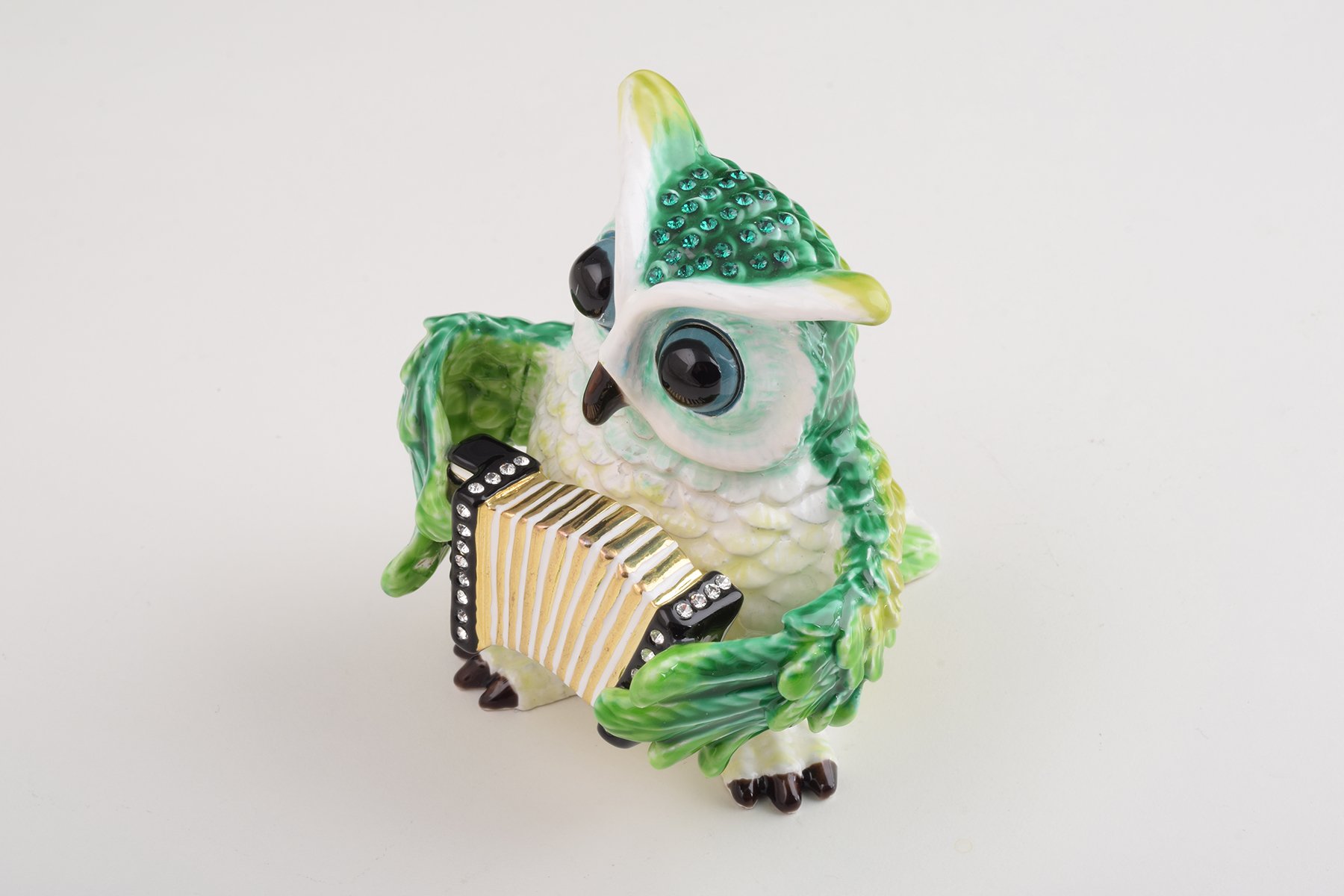 Handmade Green Owl Playing Accordion Trinket Box with Austrian crystals and 24K gold plating, featuring a secure magnetic fastener.