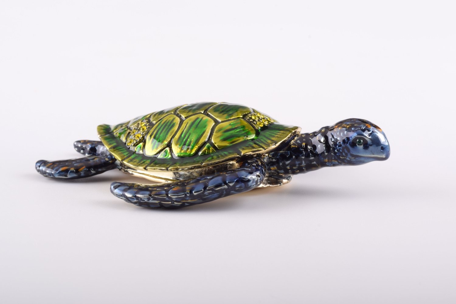 Handcrafted Green Sea Turtle trinket box with Austrian crystals and gold plating, featuring a magnetic closure.