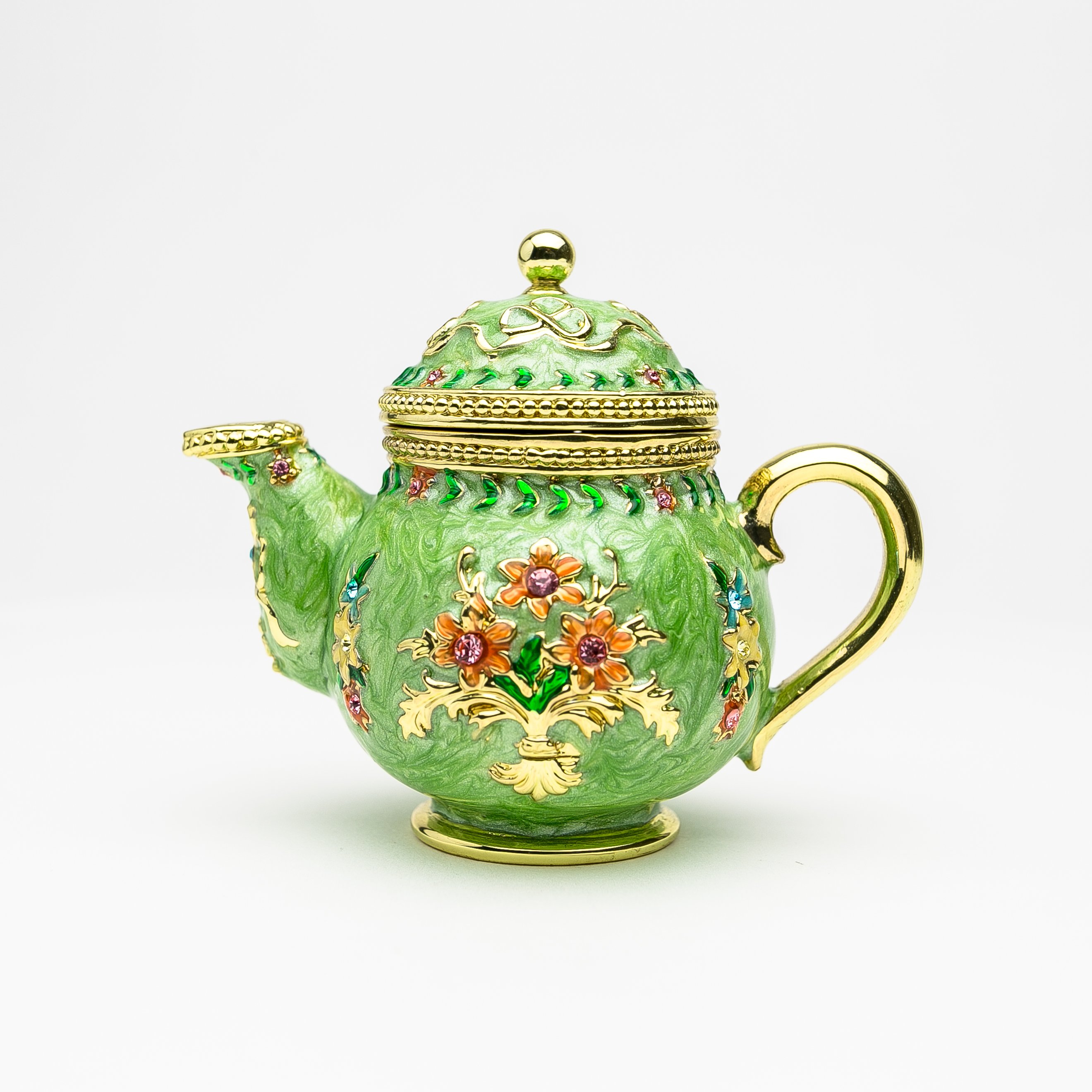 A beautifully crafted Green Teapot trinket box, handmade with Austrian crystals and plated with 24K gold or 925 silver, showcasing intricate details.