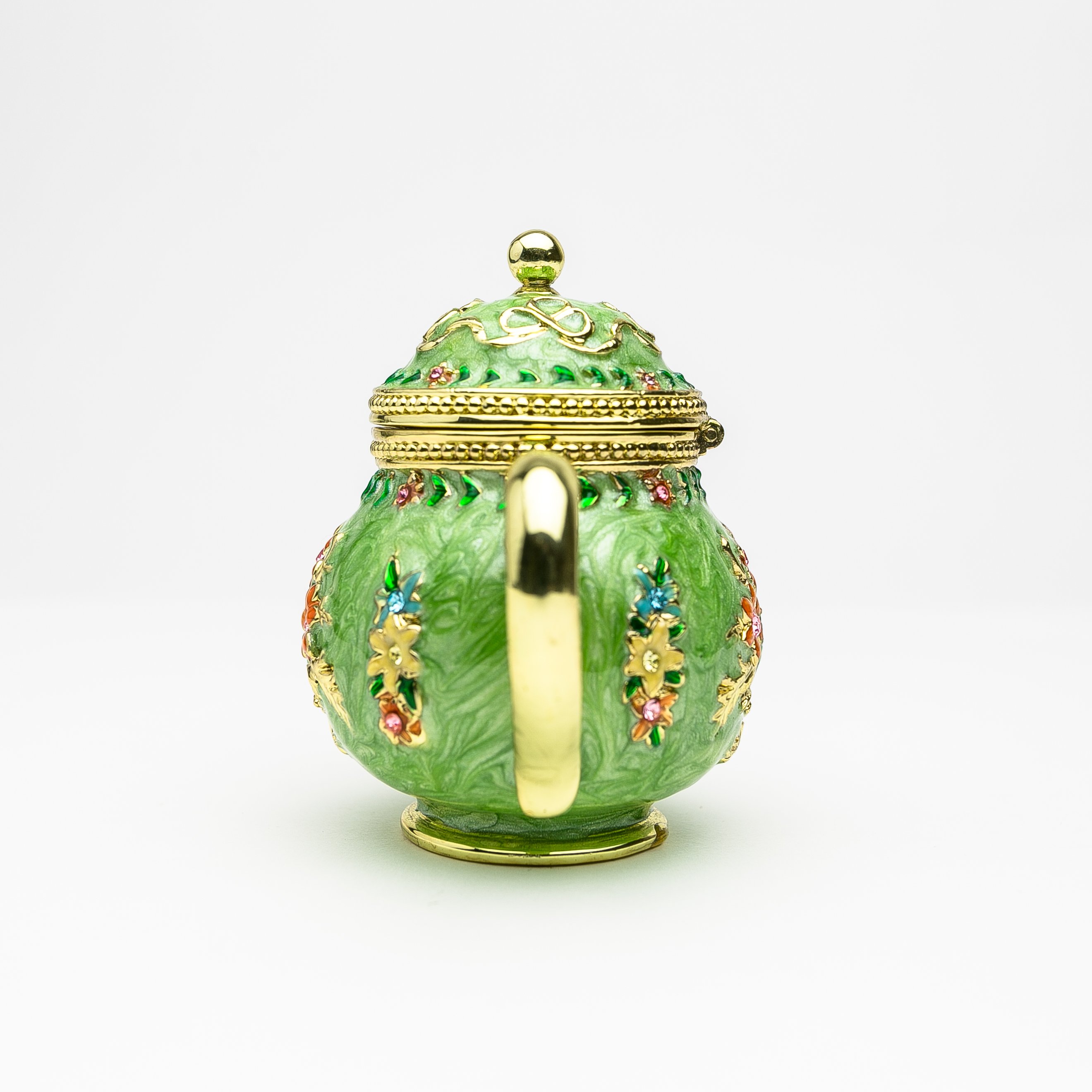 A beautifully crafted Green Teapot trinket box, handmade with Austrian crystals and plated with 24K gold or 925 silver, showcasing intricate details.