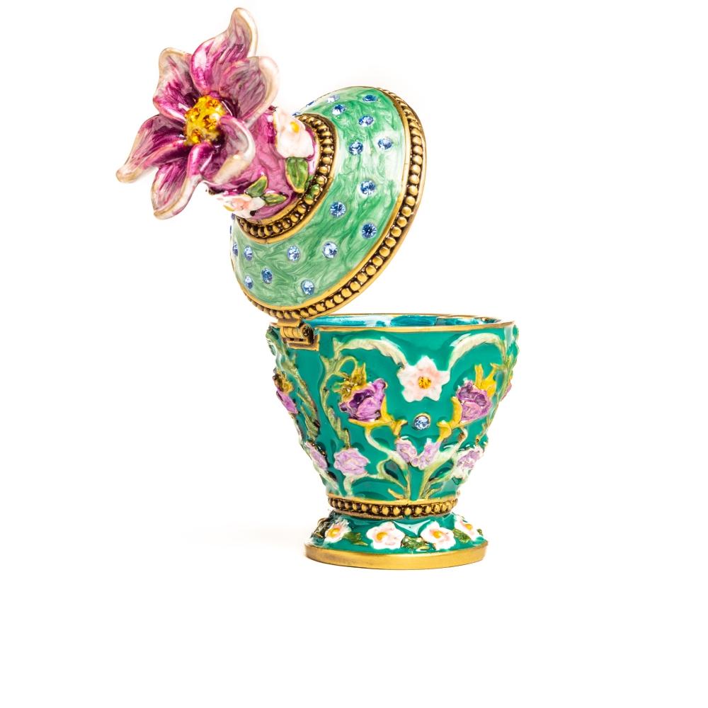 A beautifully handcrafted Green Vase Trinket Box adorned with Austrian crystals and plated with 24K gold, showcasing intricate enamel work.