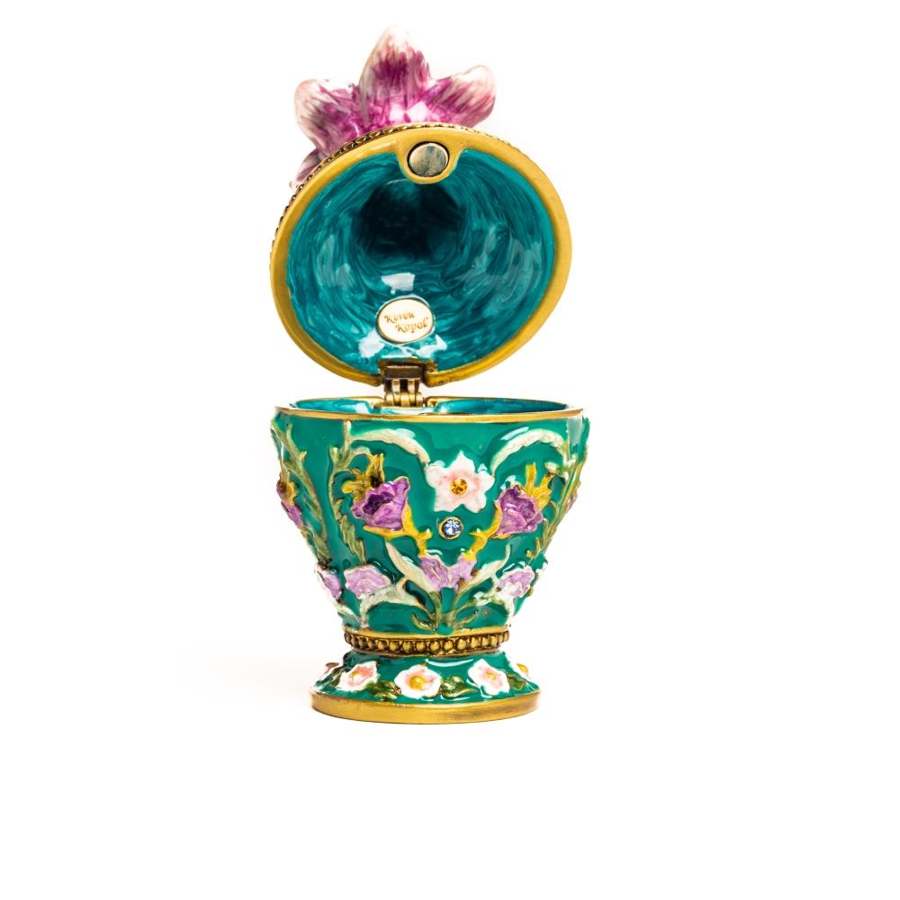 A beautifully handcrafted Green Vase Trinket Box adorned with Austrian crystals and plated with 24K gold, showcasing intricate enamel work.