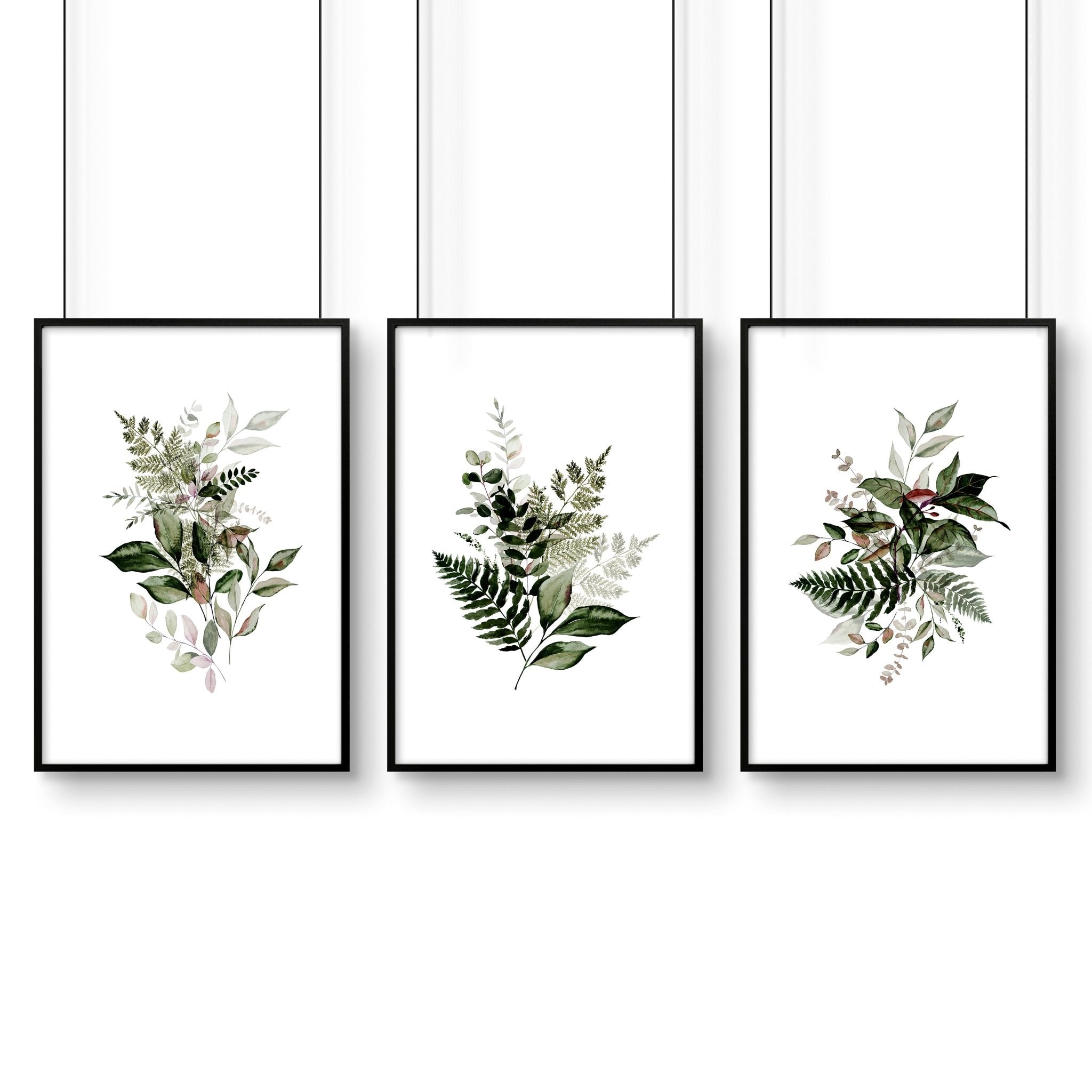 Set of 3 Greenery wall art prints featuring vibrant foliage designs, perfect for home or office decor.