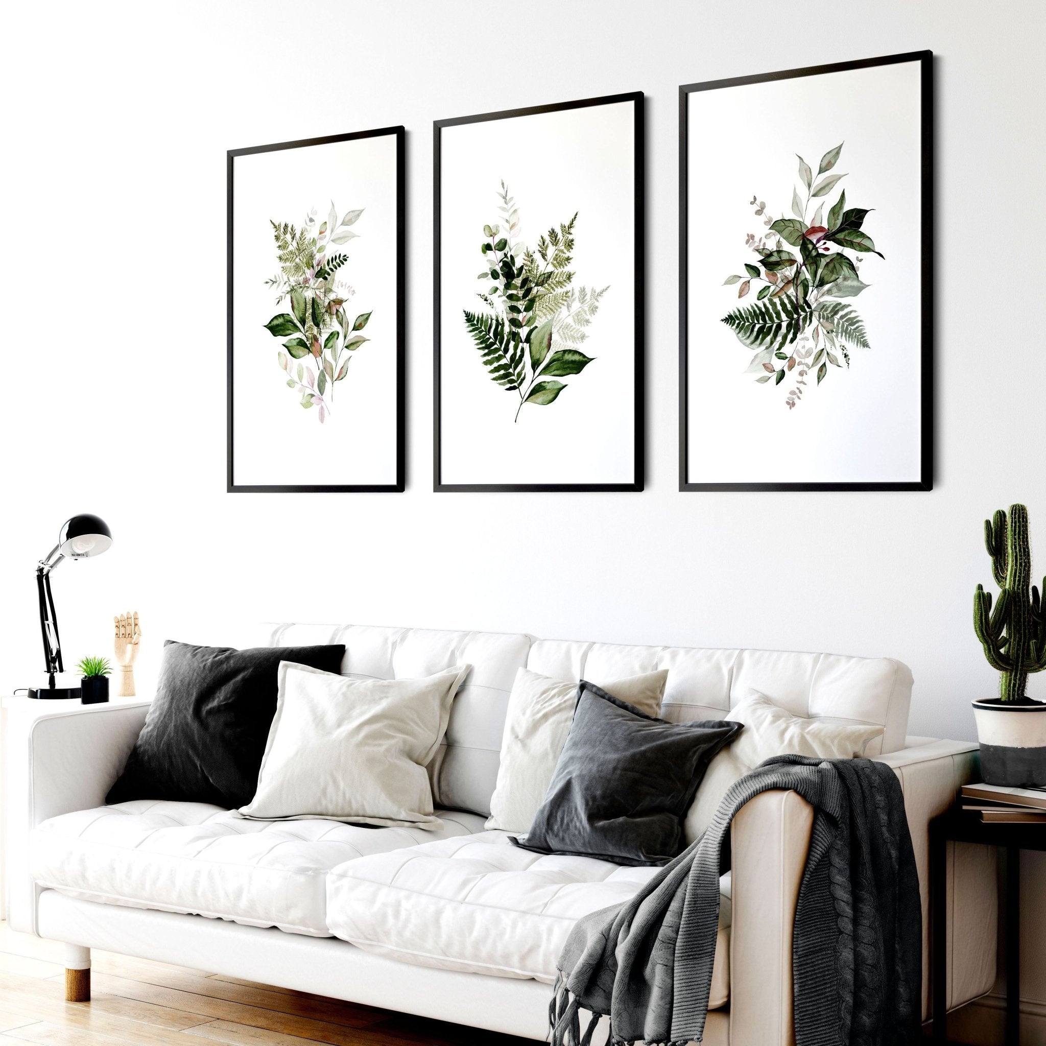 Set of 3 Greenery wall art prints featuring vibrant foliage designs, perfect for home or office decor.