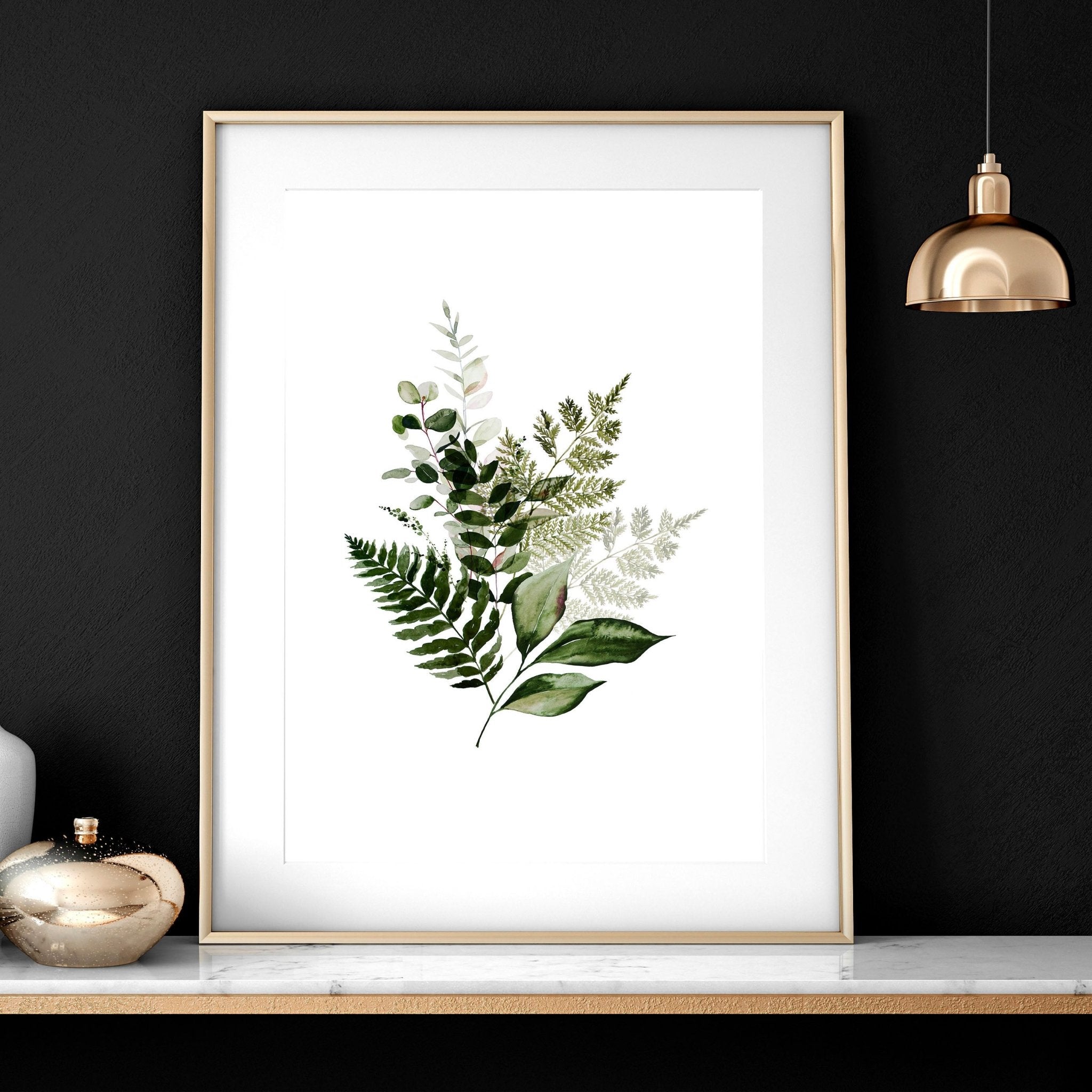 Set of 3 Greenery wall art prints featuring vibrant foliage designs, perfect for home or office decor.