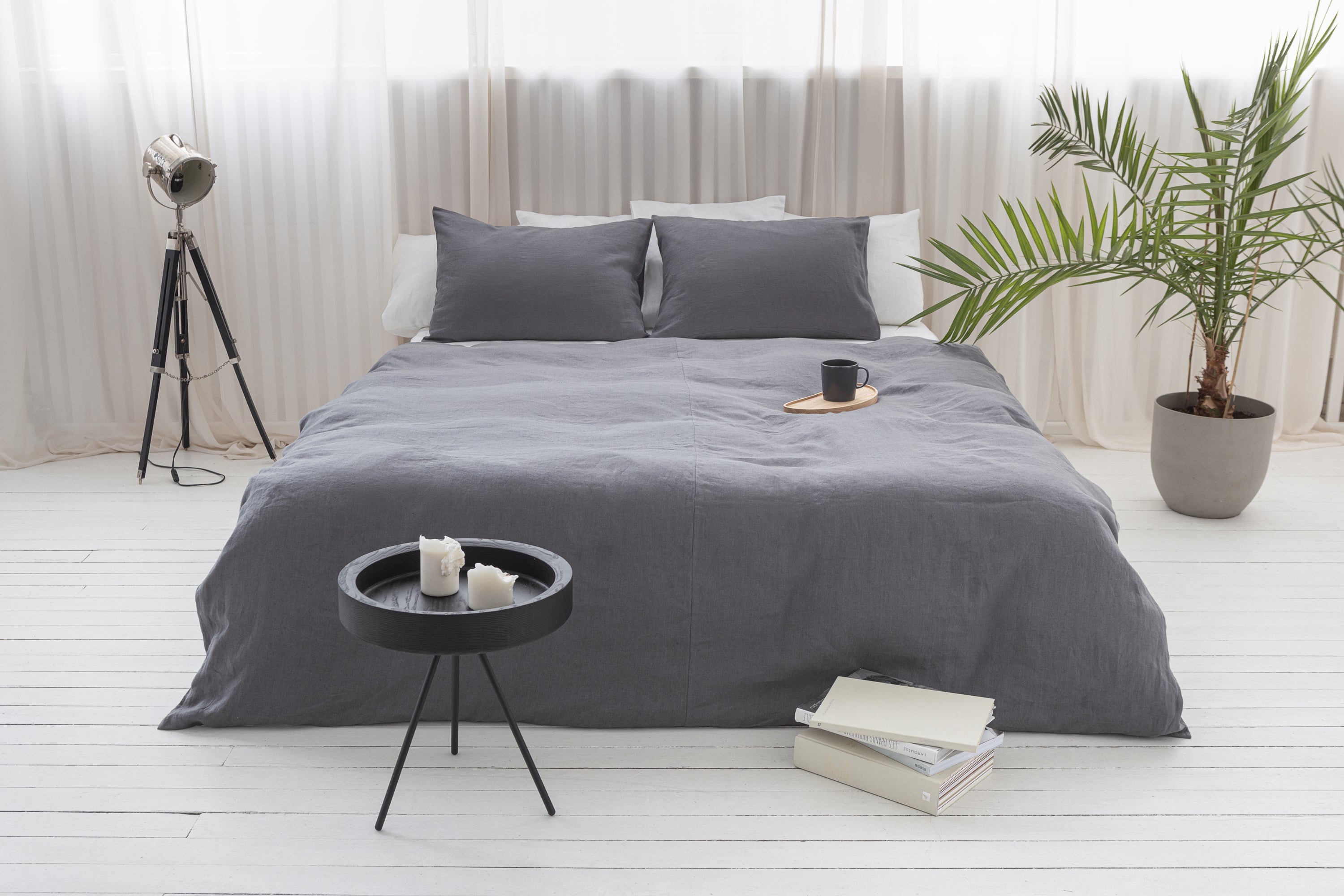 Elegant grey linen bedding set featuring a zipper duvet cover and envelope pillowcases, showcasing a minimalist Scandinavian design.