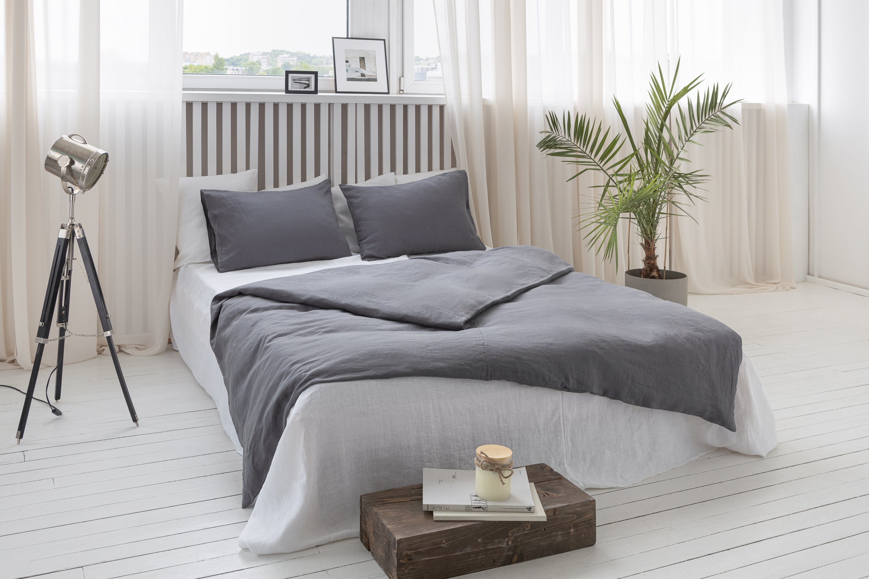 Elegant grey linen bedding set featuring a zipper duvet cover and envelope pillowcases, showcasing a minimalist Scandinavian design.