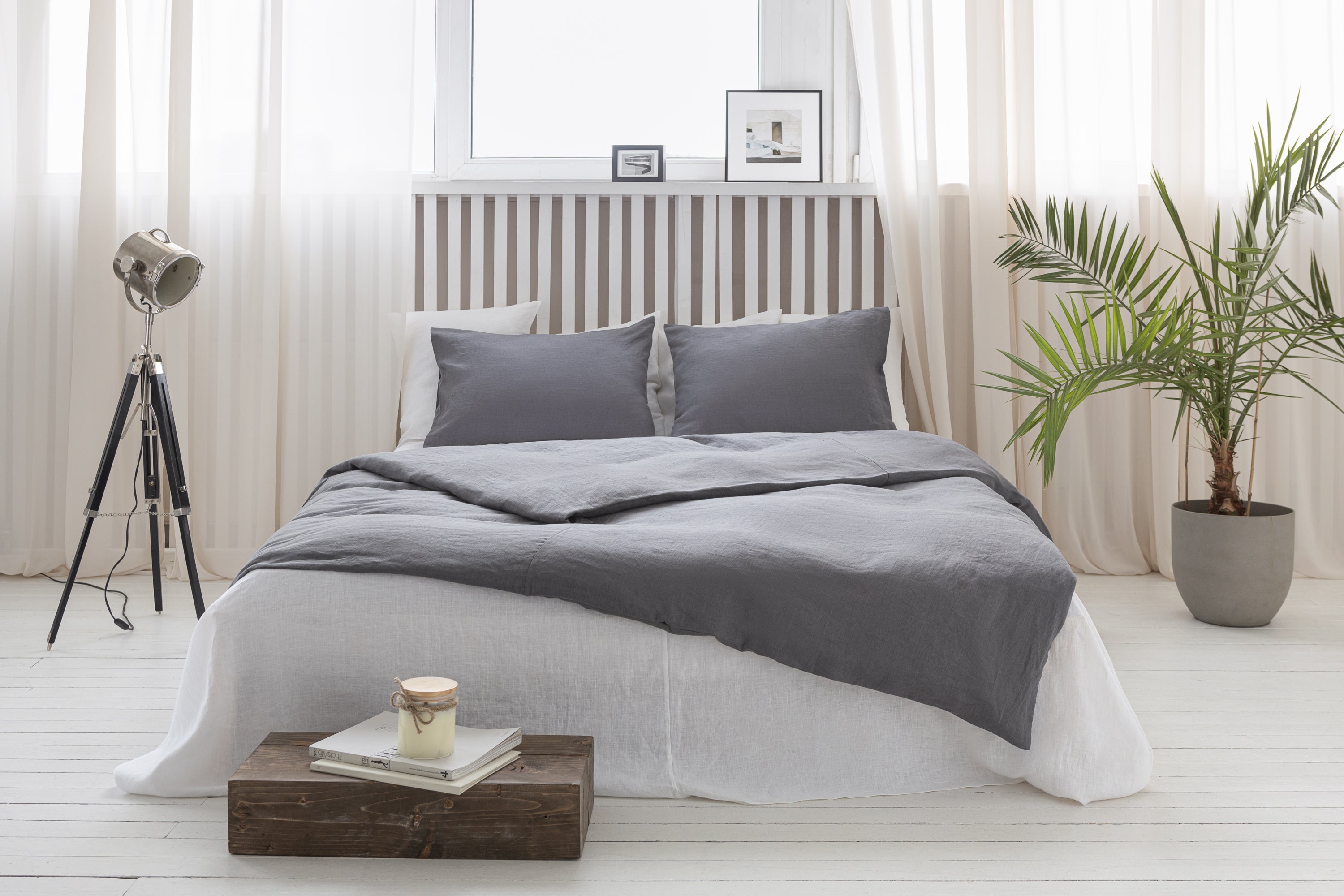 Elegant grey linen bedding set featuring a zipper duvet cover and envelope pillowcases, showcasing a minimalist Scandinavian design.