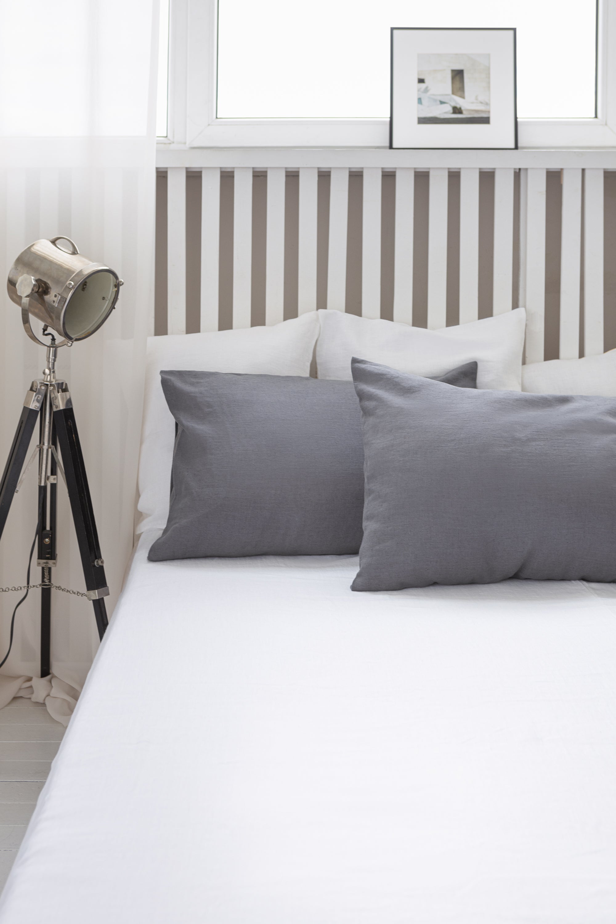 Elegant grey linen bedding set featuring a zipper duvet cover and envelope pillowcases, showcasing a minimalist Scandinavian design.