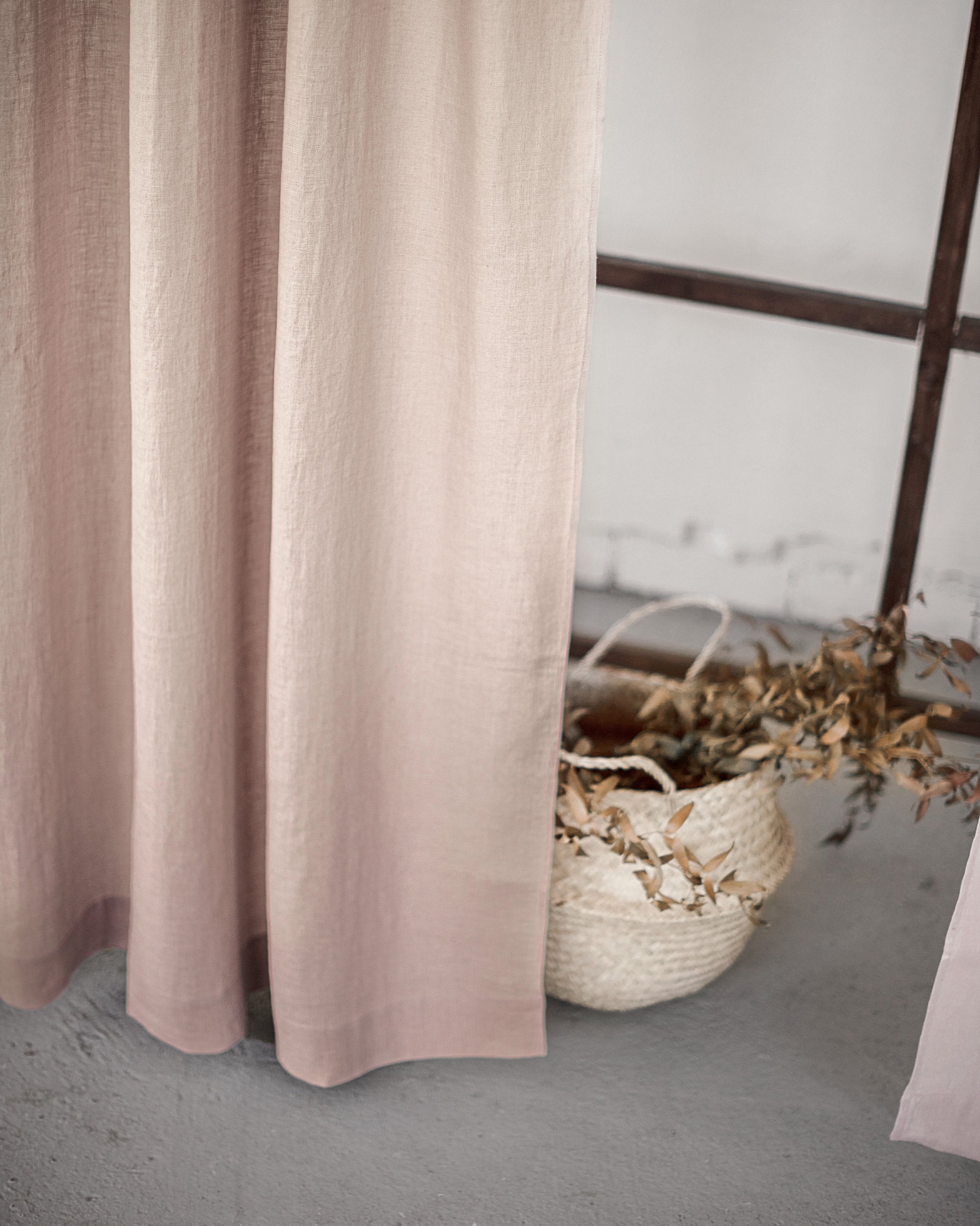 Soft greyish mint linen curtain with multifunctional tape, elegantly draped to showcase its semi-sheer texture and versatile hanging options.