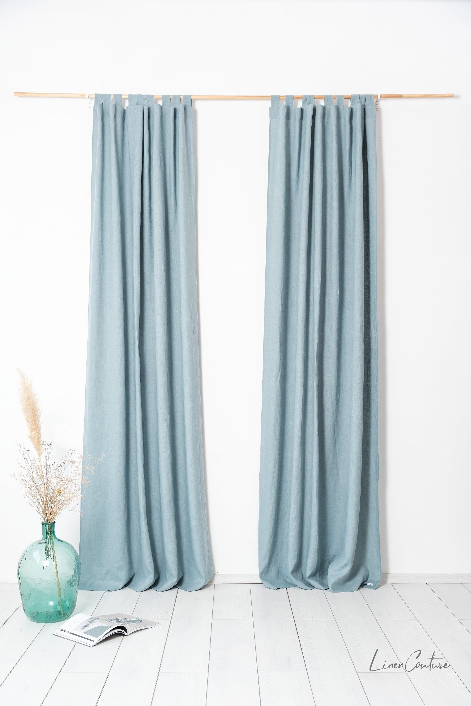 Greyish Mint linen curtain with tab tops, showcasing a soft texture and elegant color, perfect for enhancing any room's decor.