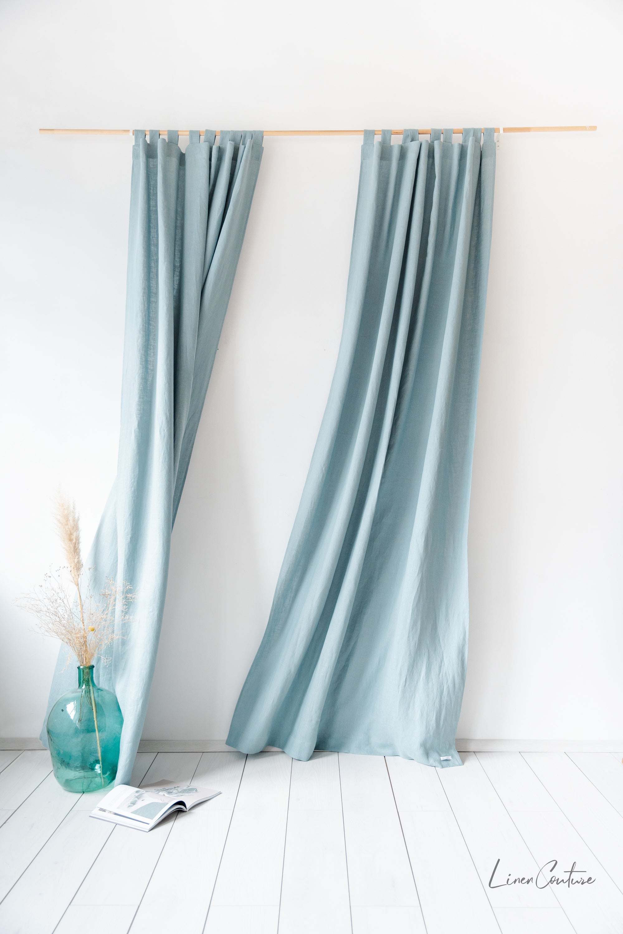 Greyish Mint linen curtain with tab tops, showcasing a soft texture and elegant color, perfect for enhancing any room's decor.