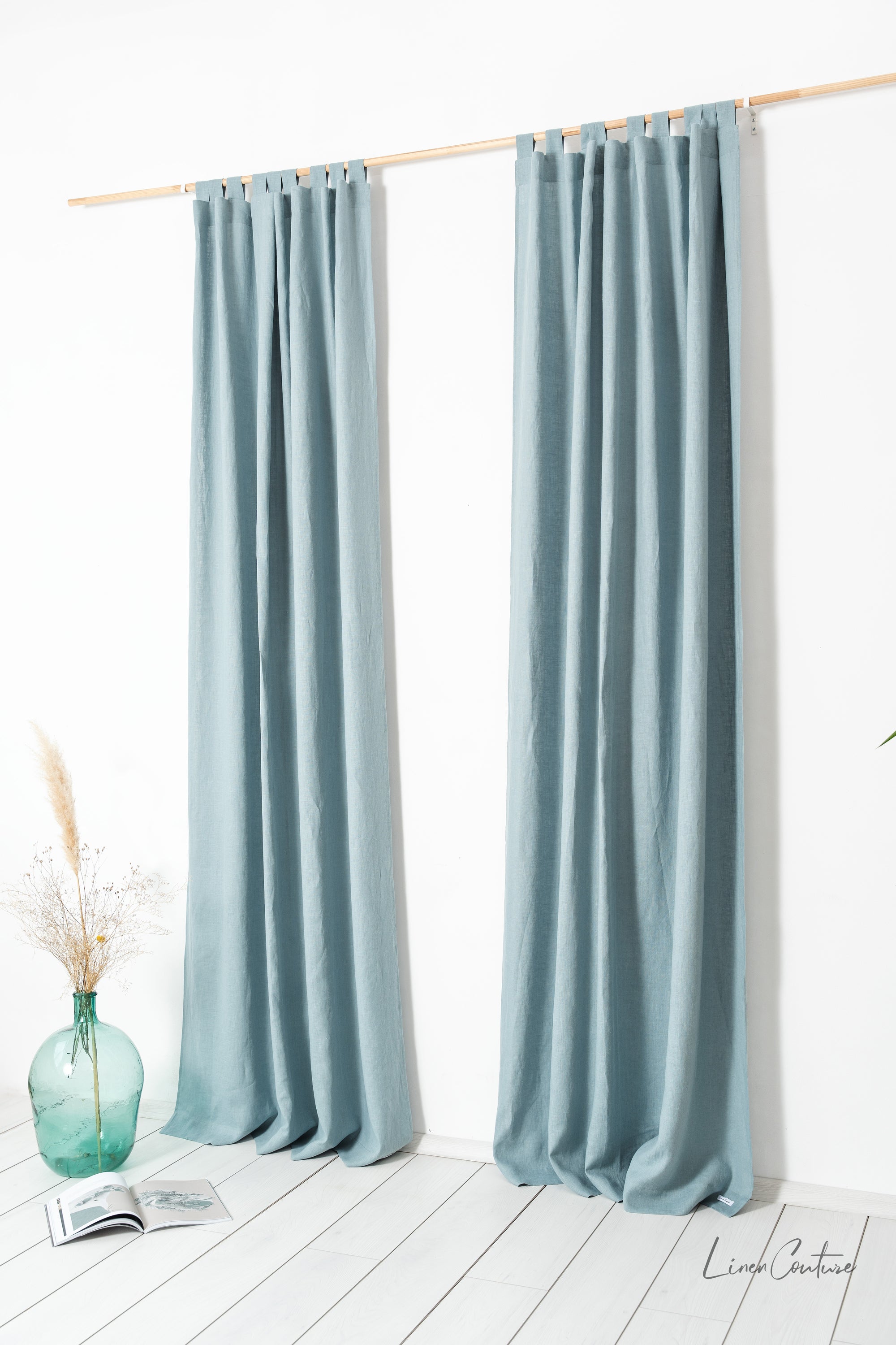 Greyish Mint linen curtain with tab tops, showcasing a soft texture and elegant color, perfect for enhancing any room's decor.