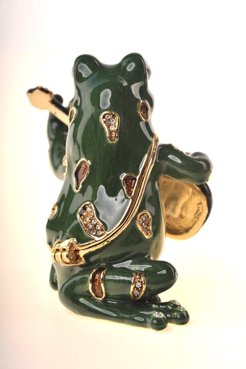 A beautifully crafted enamel painted trinket box shaped like a frog playing a guitar, adorned with Austrian crystals and 925 silver plating.