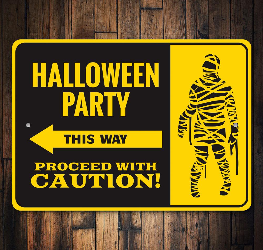 A spooky Halloween Party This Way Sign made of aluminum, featuring eerie graphics and customizable text, perfect for Halloween decorations.