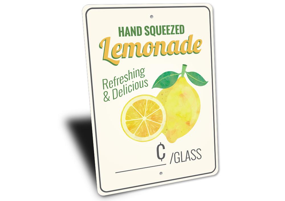 Hand Squeezed Lemonade Sign made of durable aluminum, featuring vibrant colors and customizable text, perfect for cafes and restaurants.