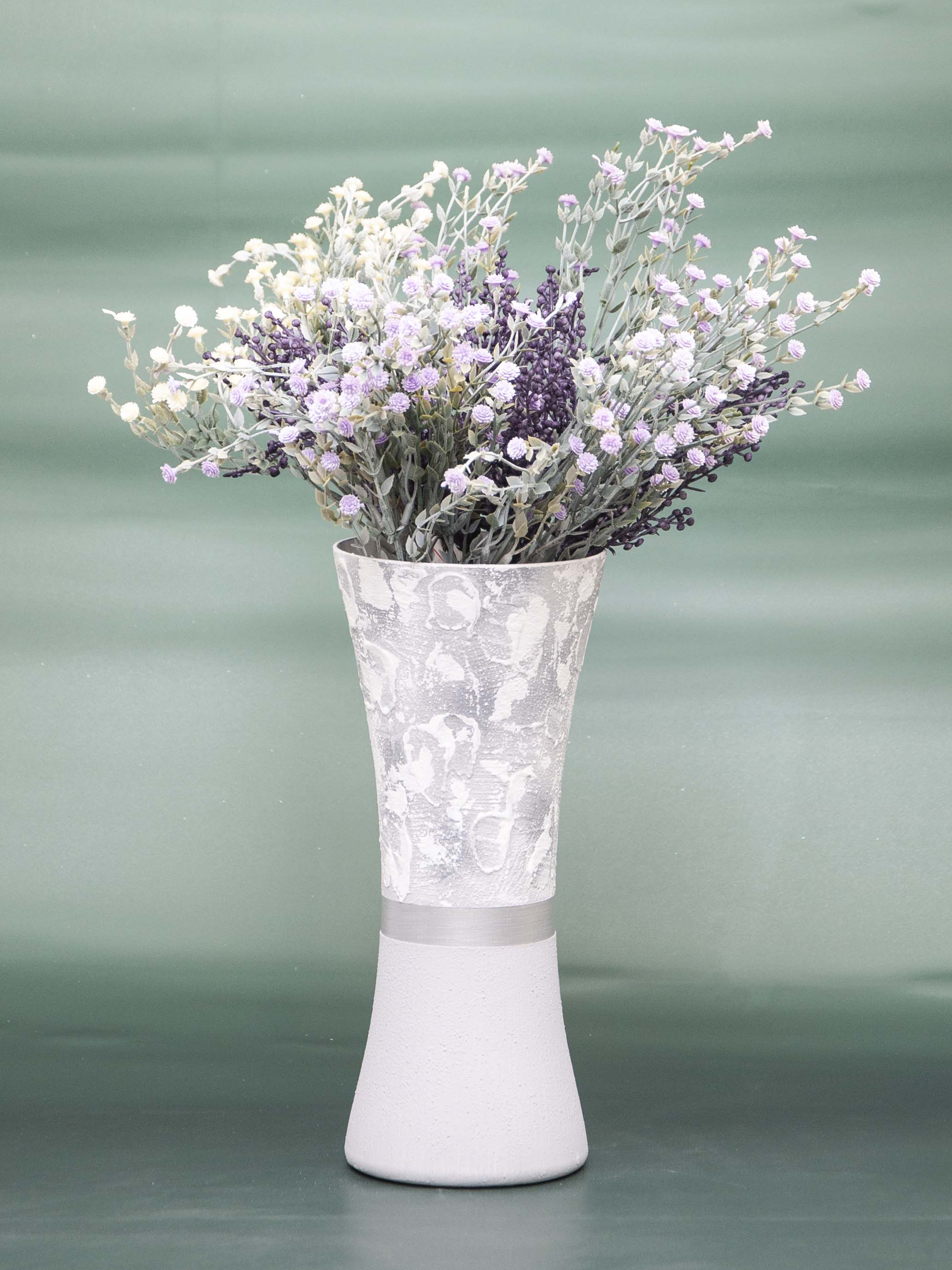 A beautifully hand-painted glass vase featuring intricate floral and geometric designs, perfect for displaying flowers in any interior setting.