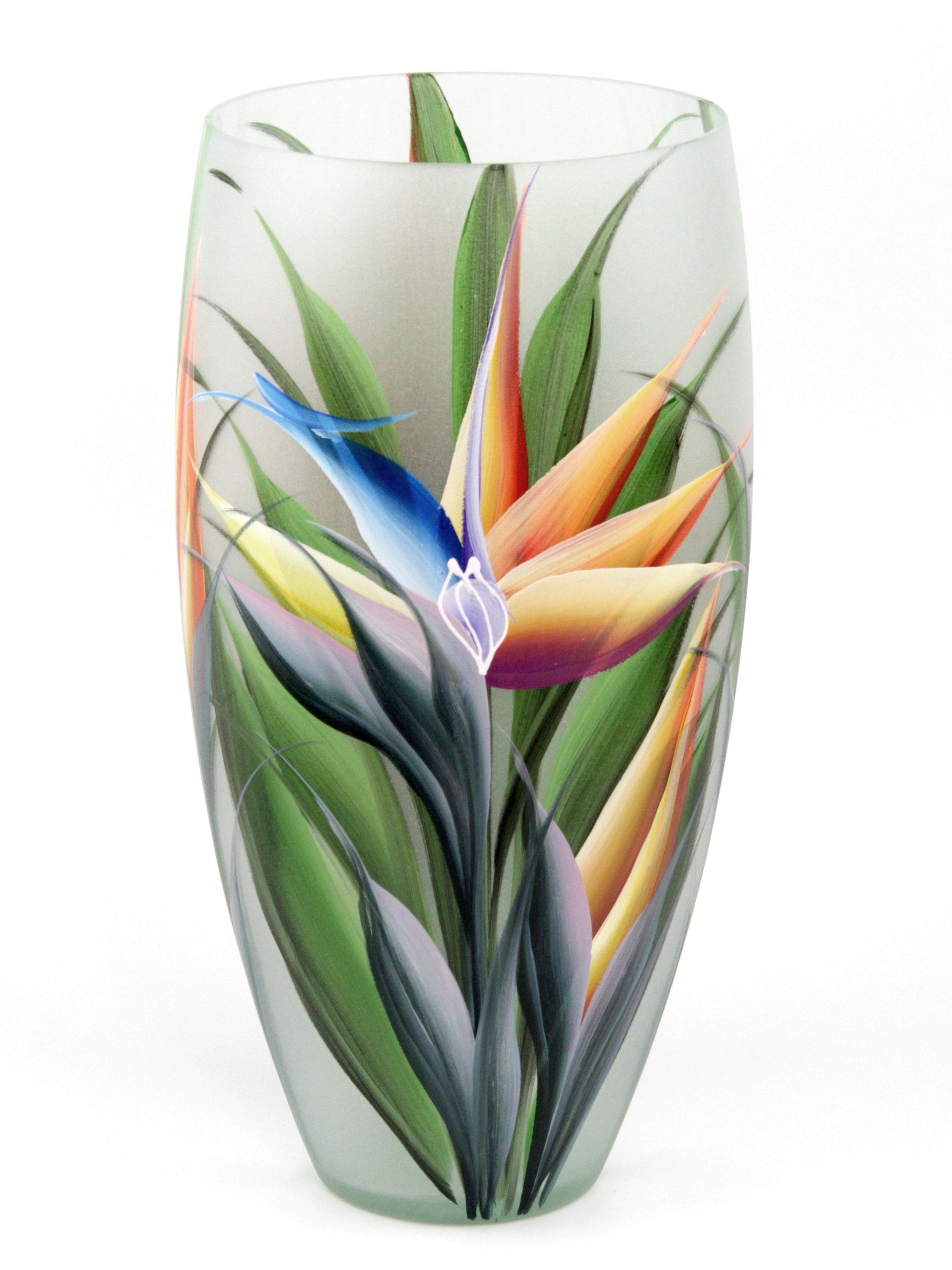 A beautifully hand-painted glass vase featuring unique floral and geometric designs, perfect for displaying flowers.