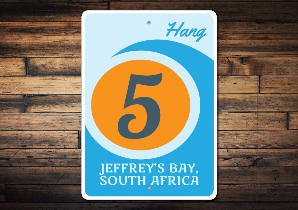 A vibrant Hang Five Sign made of high-quality aluminum, featuring beach-themed graphics, perfect for coastal decor.