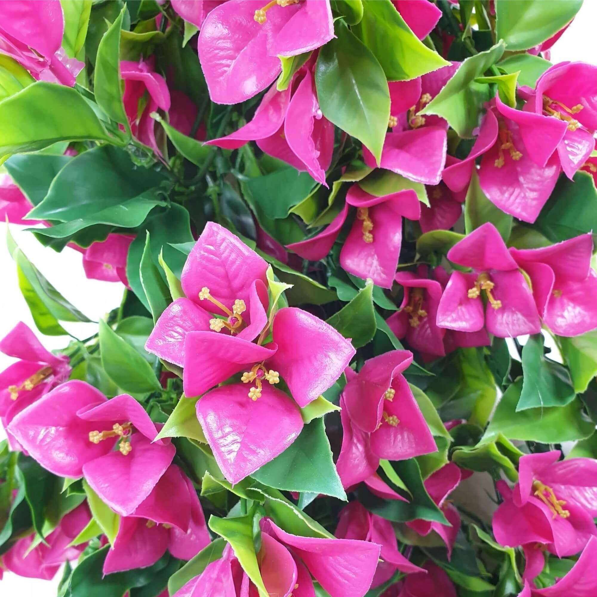 Hanging artificial bougainvillea plant with vibrant pink and lilac flowers, showcasing lush green UV resistant leaves, perfect for indoor and outdoor decor.