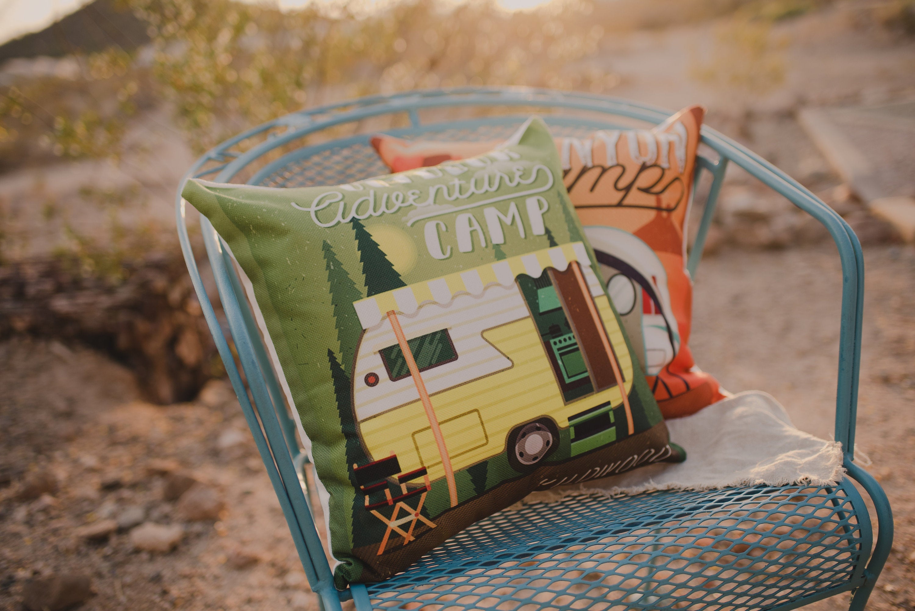 Happy Camper pillow cover featuring an Outdoor Adventure Camp trailer design, made from a durable cotton/polyester blend with a concealed zipper.