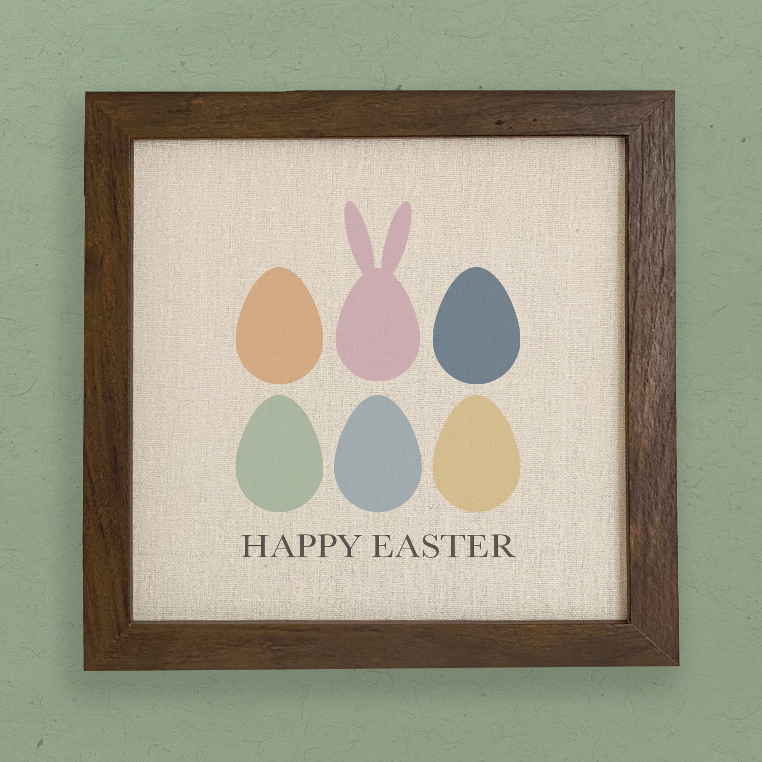 Happy Easter Eggs framed sign with a stylized wood frame, featuring a linen-look background and eco-friendly printing.